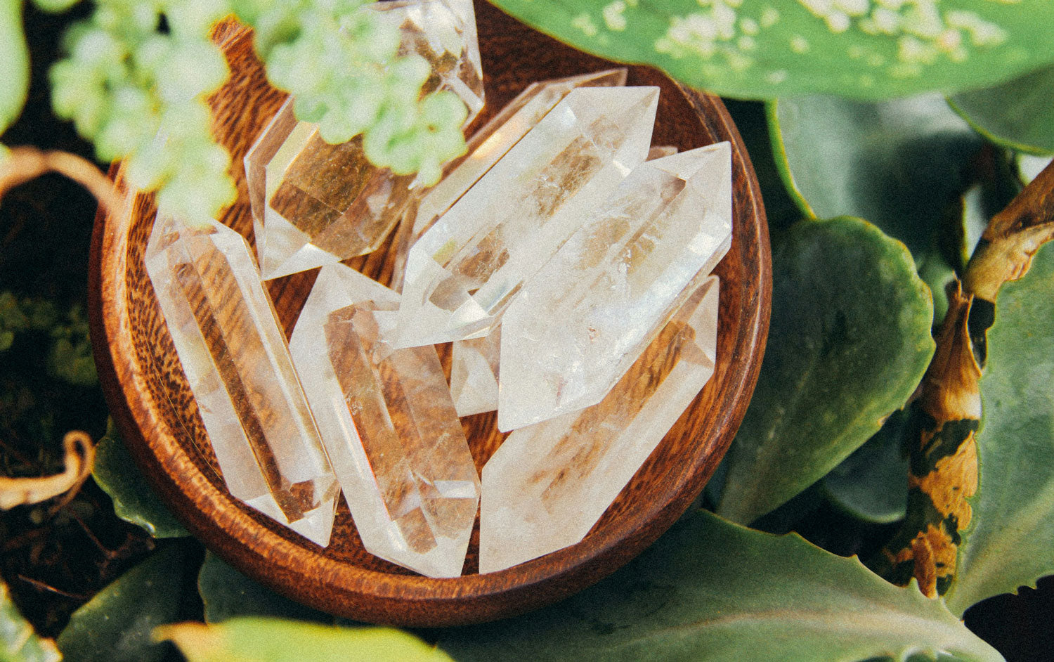 Natural clear quartz cluster sparkling with a gentle glow