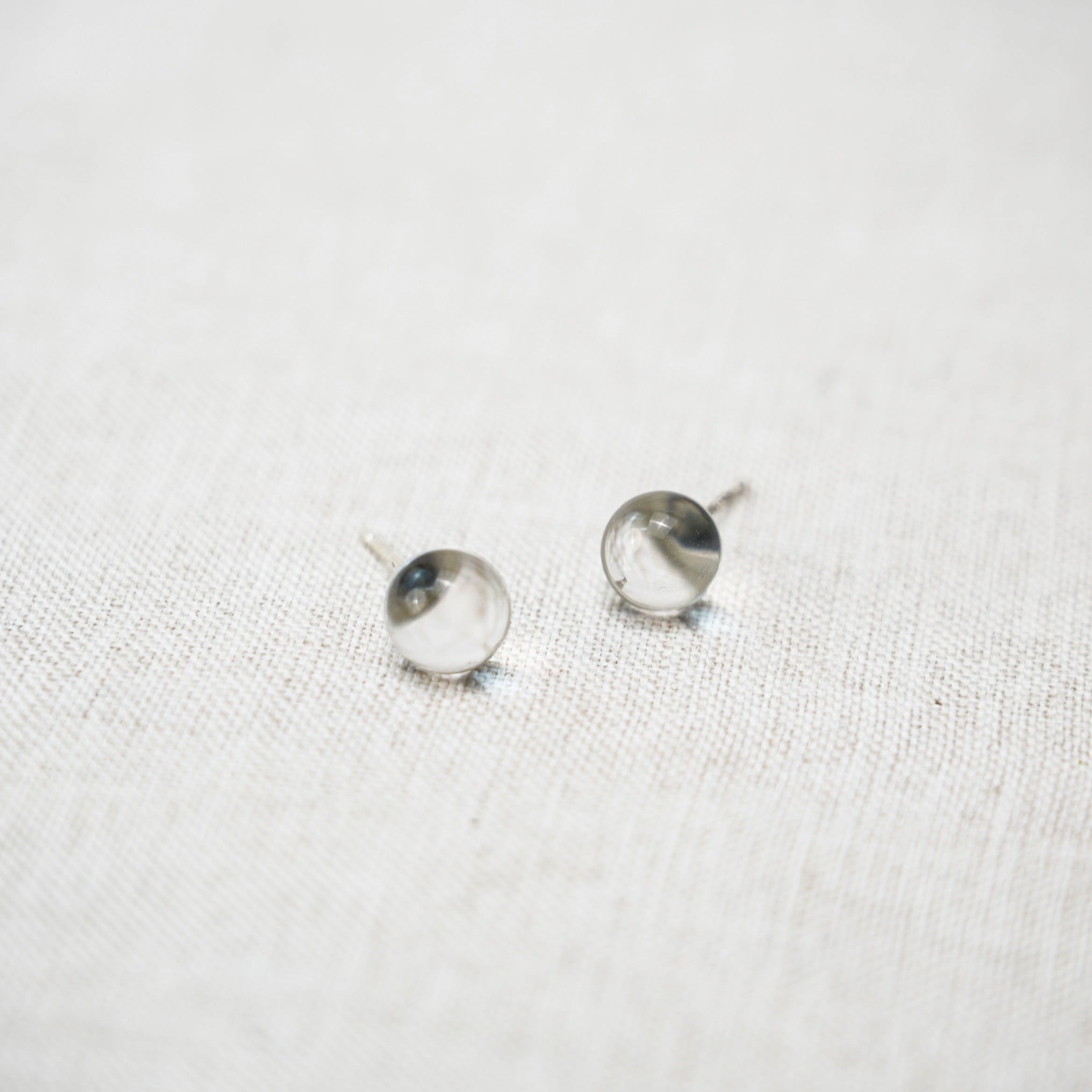 Stunning handcrafted clear quartz stud earrings, ideal for everyday wear and special occasions.