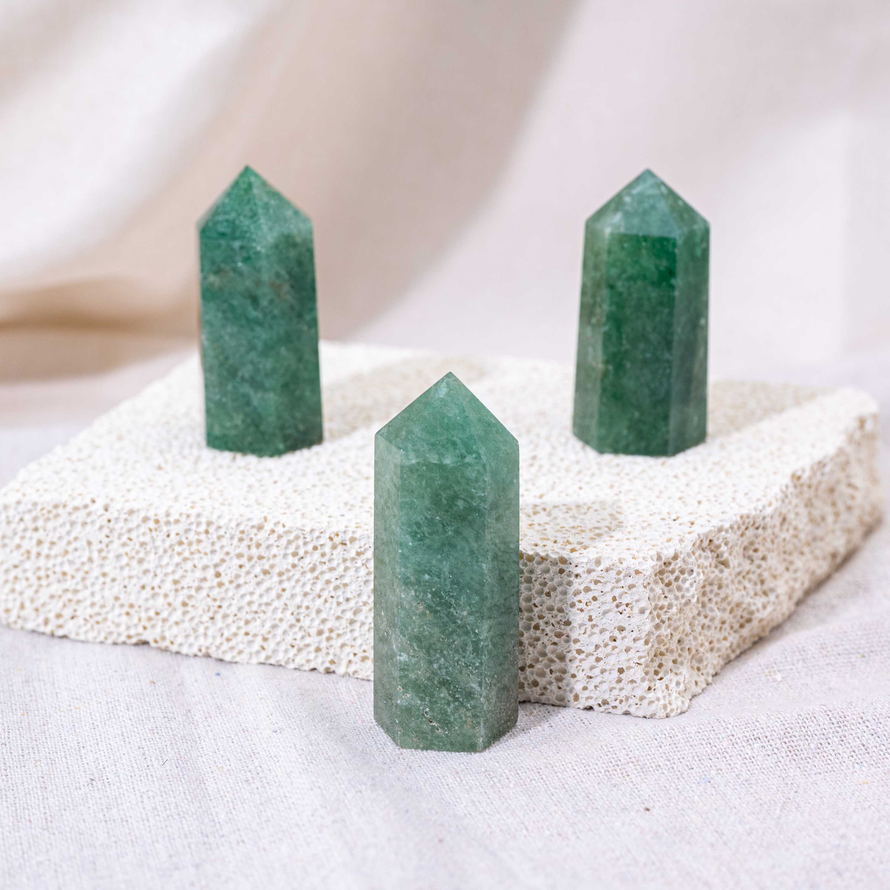 Unique Green Strawberry Quartz Point, showcasing intricate patterns.