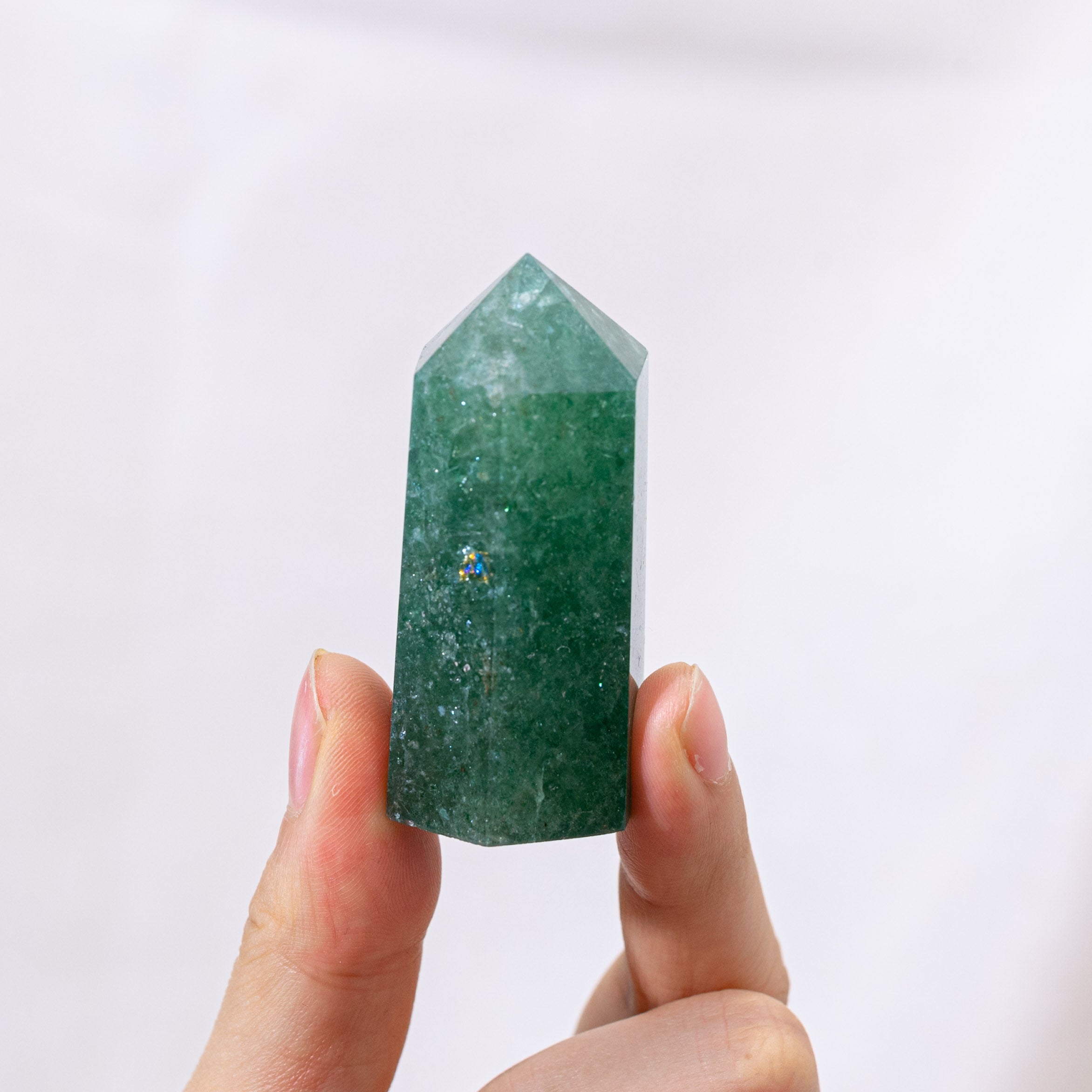 Promotes emotional healing and personal growth with Green Strawberry Quartz.
