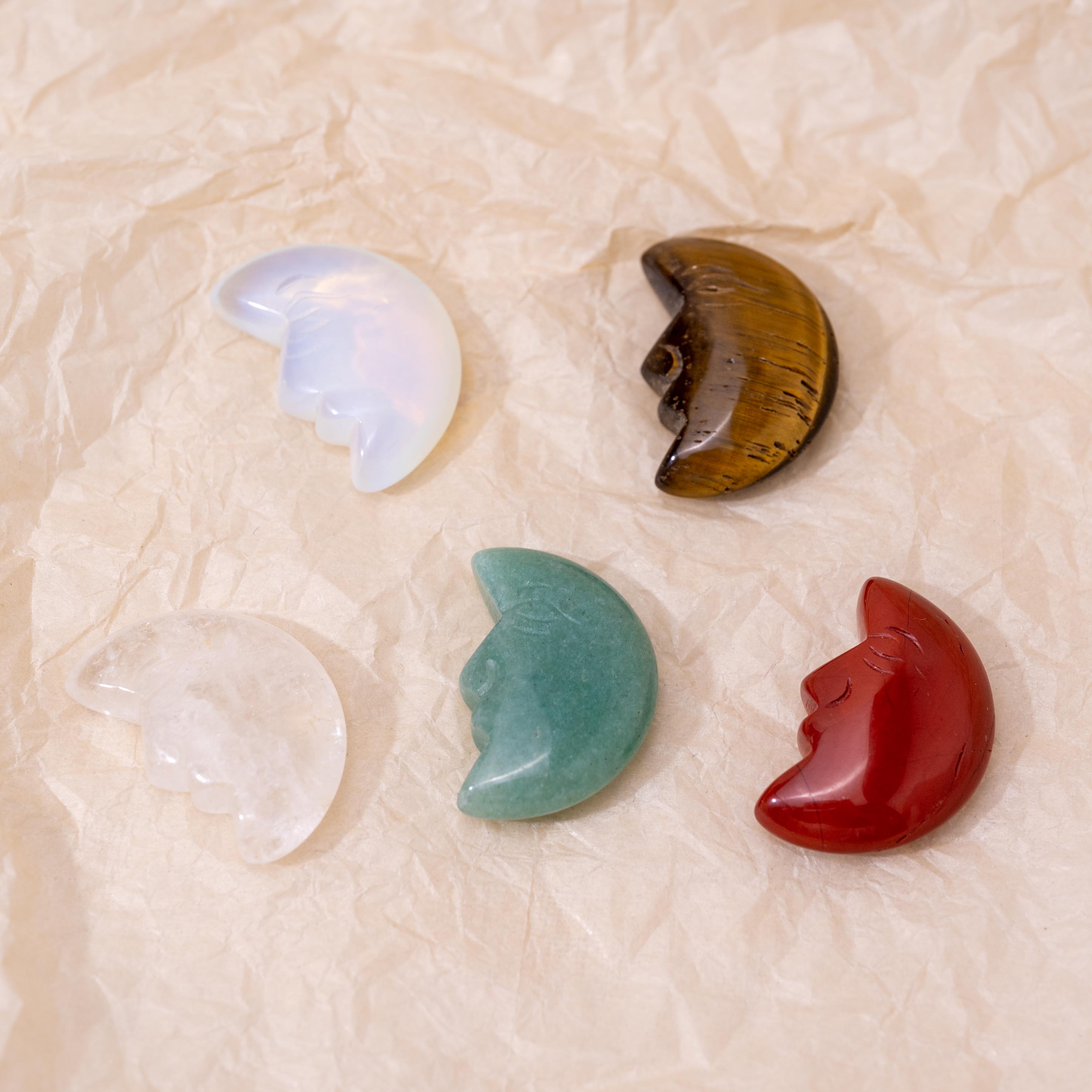 The Opalite Mini Moonface supports emotional healing and harmony.