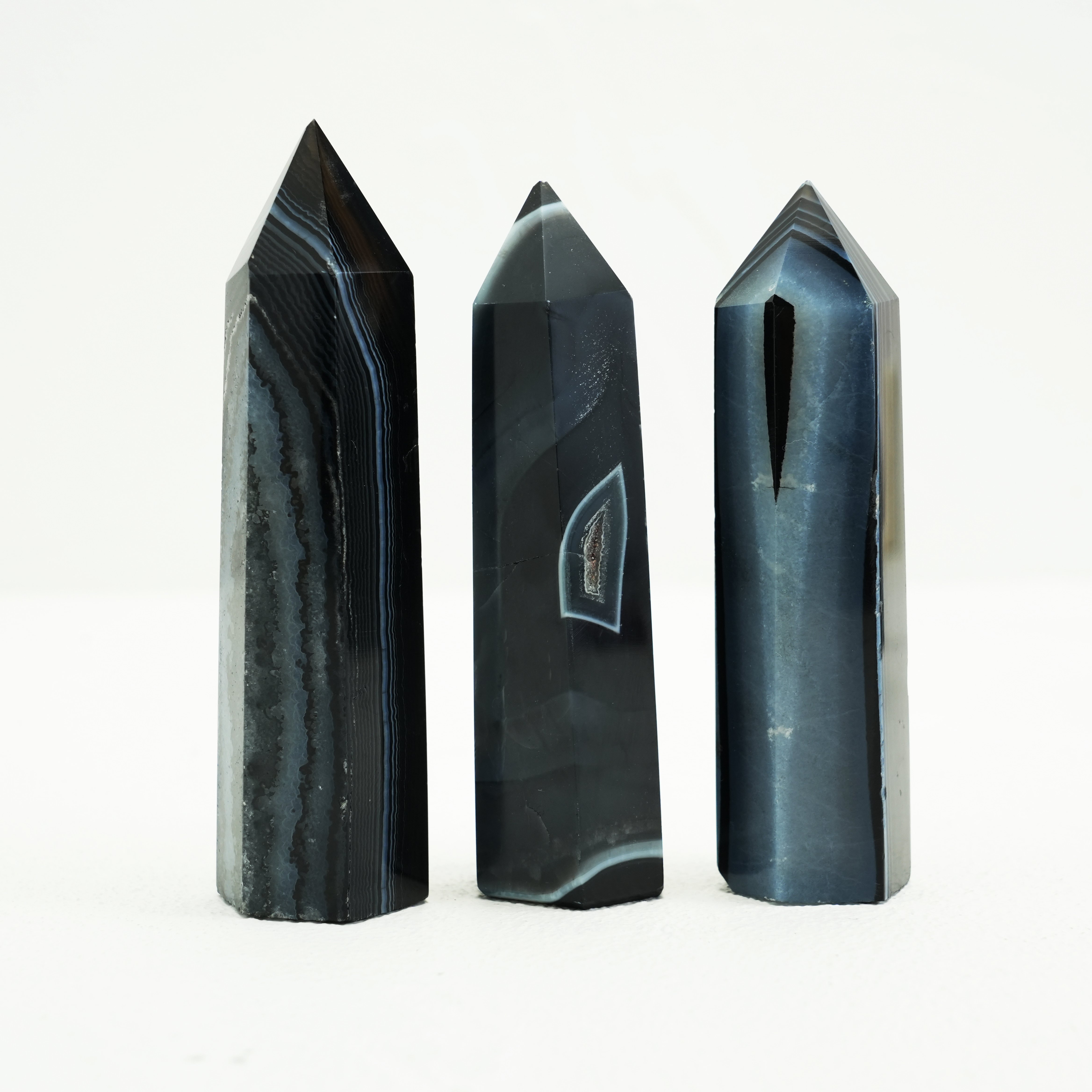 Black Sardonyx Point stone offering spiritual protection