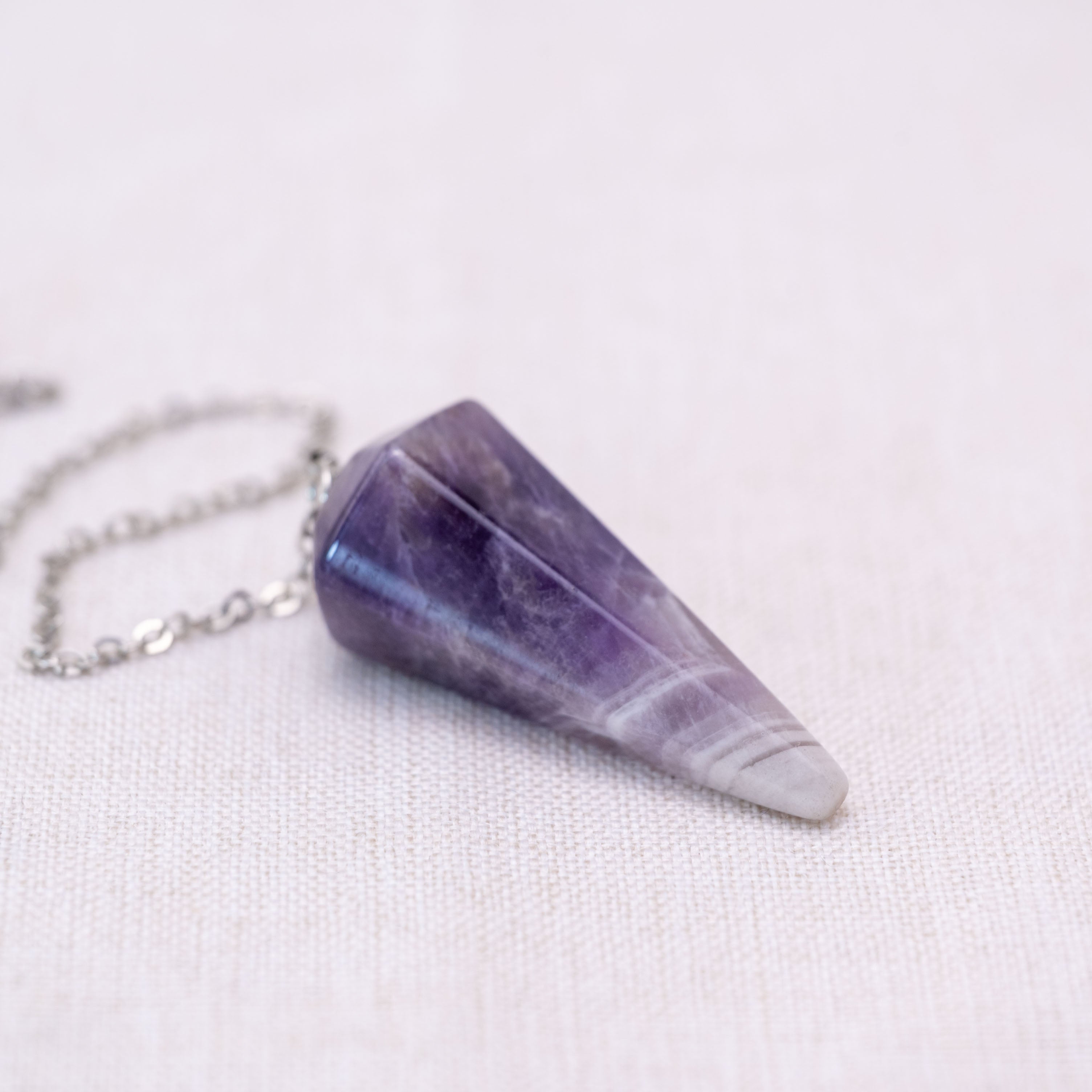 Amethyst Cone Pendulum for clarity and spiritual insight.