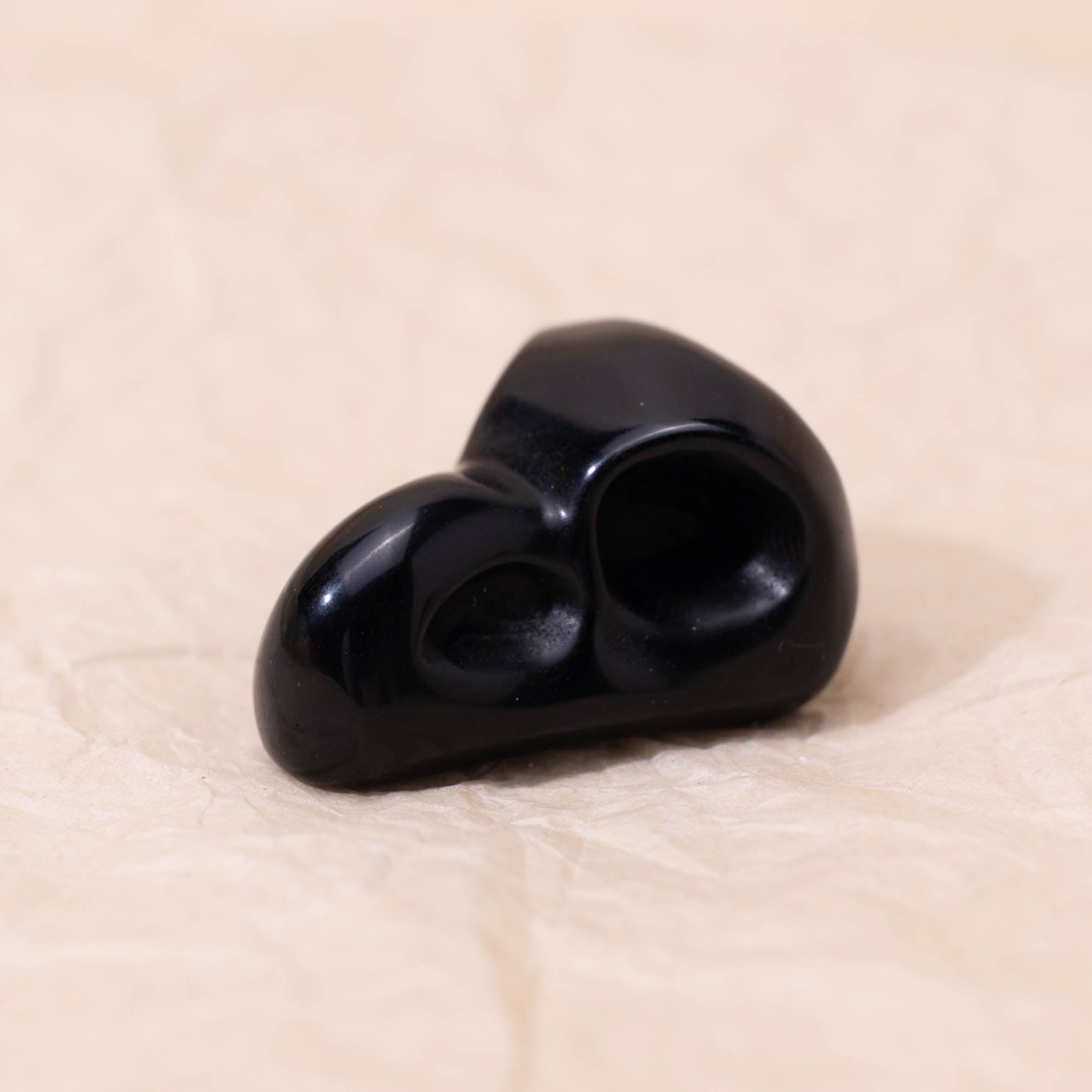 Black Obsidian Mini Crow Skull, provides protection and emotional stability.