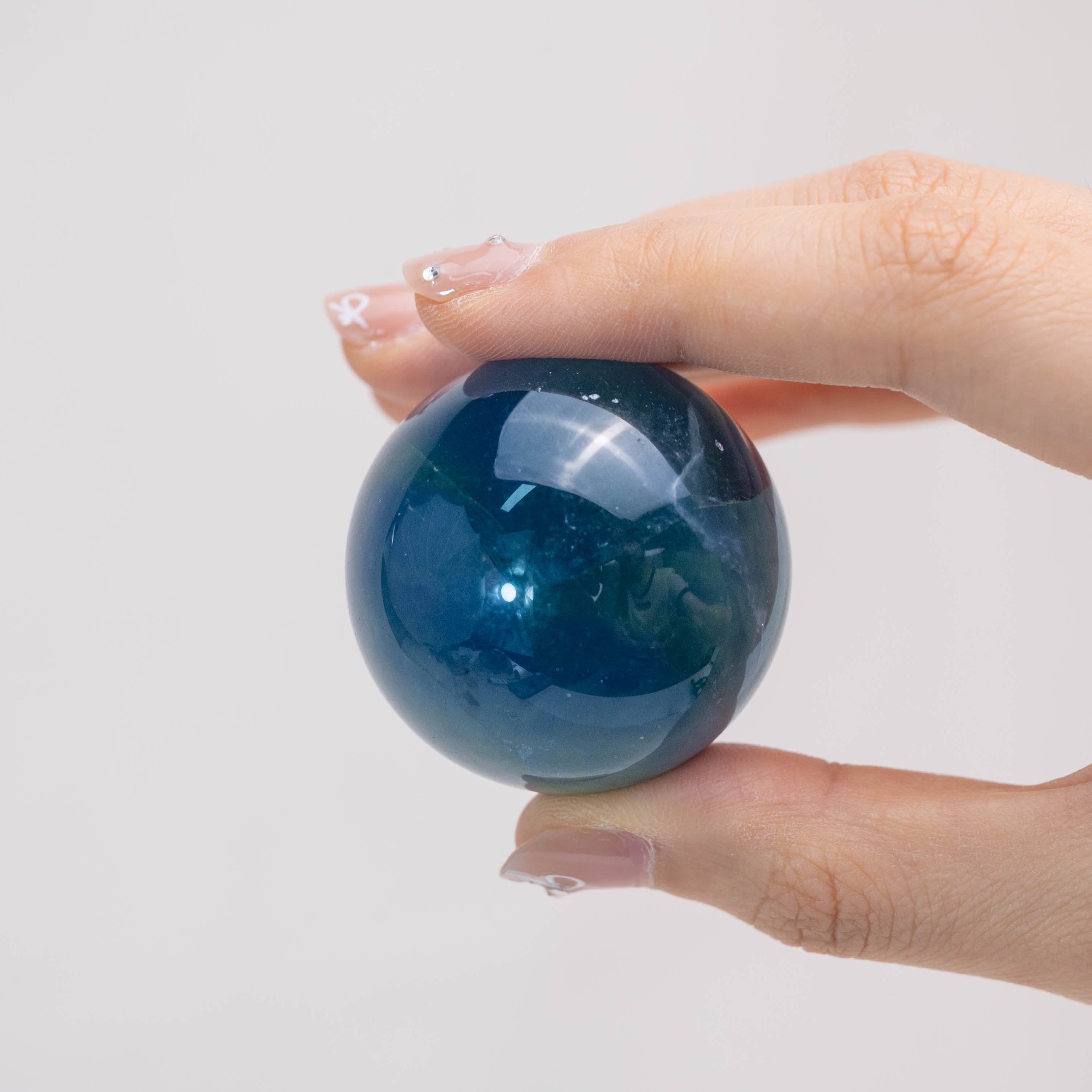 Hand-polished Blue Fluorite Sphere for clarity and focus