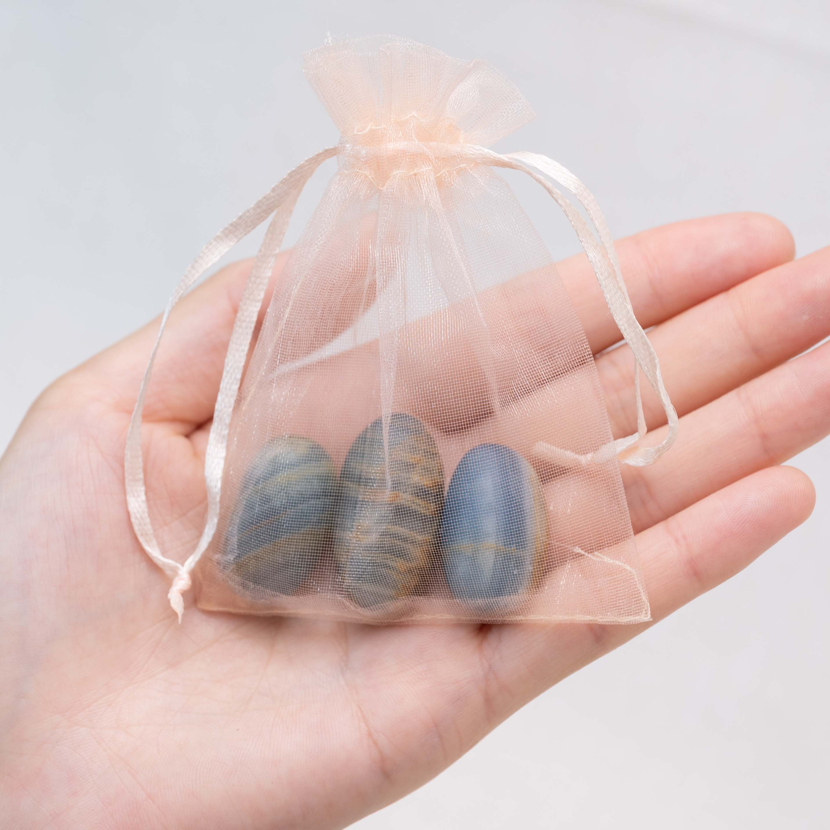 Detail shot of Blue Onyx tumbled stone's deep color.