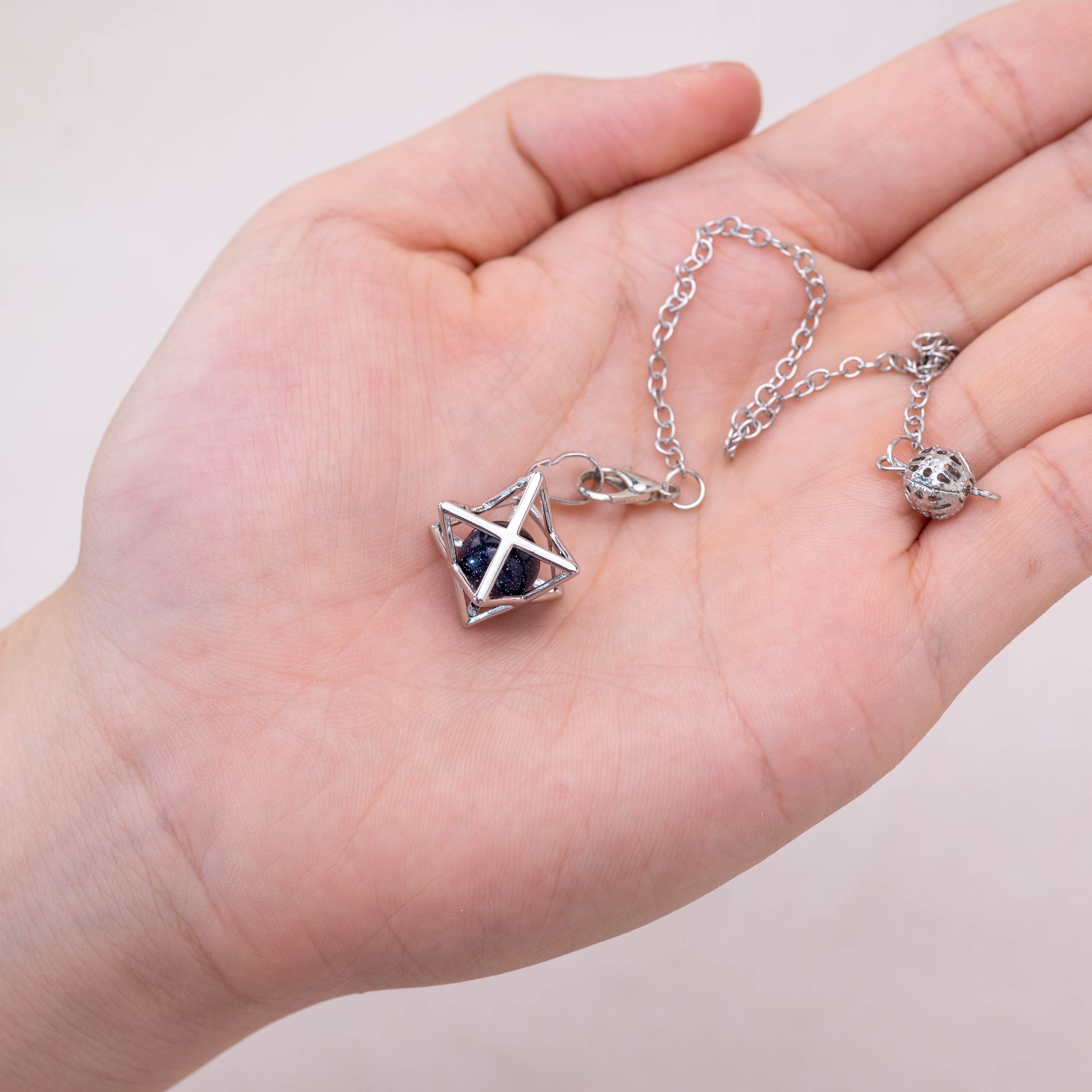 Blue Sand Stone Merkaba pendulum enhancing focus