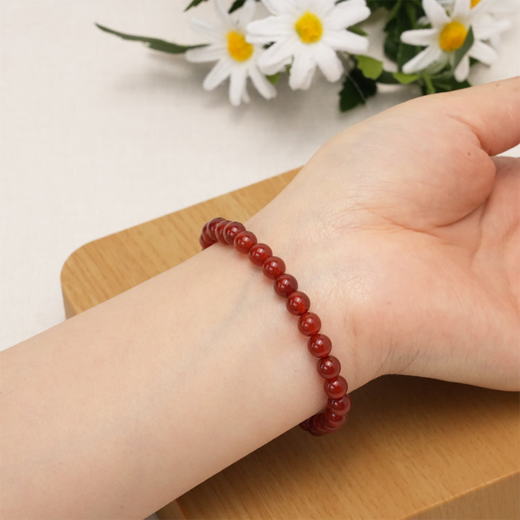 Polished Carnelian gemstone bracelet for energy and motivation