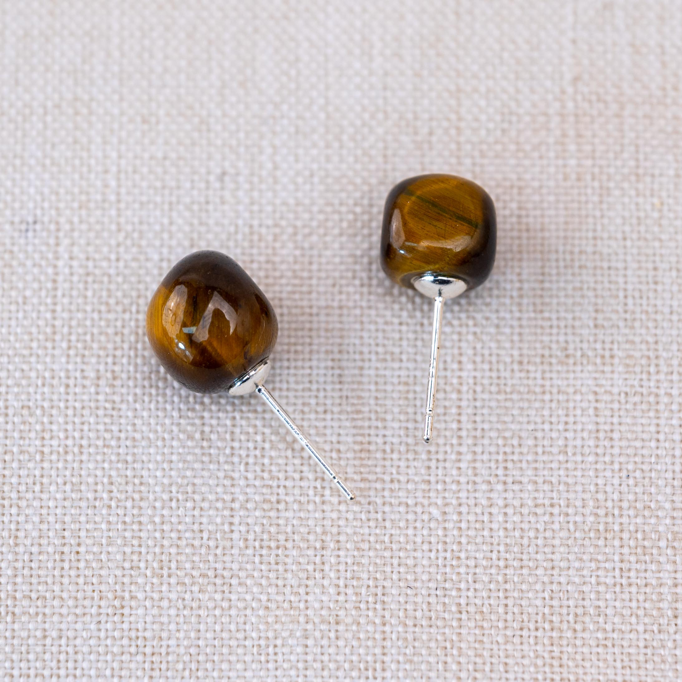 Handcrafted from genuine tiger eye, they are an elegant accessory for any occasion.