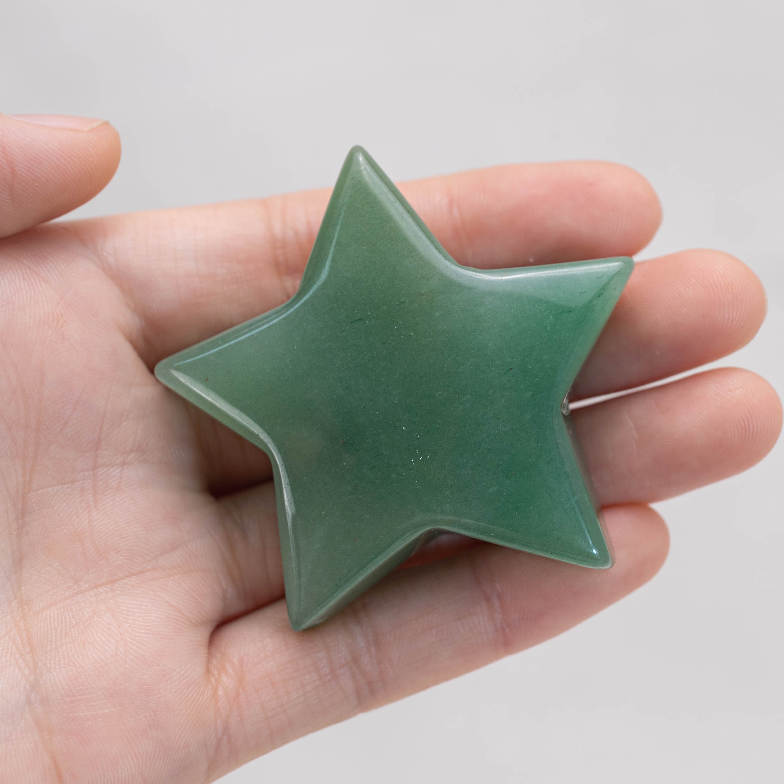 Detailed view of Green Aventurine Star/Moon Palm Stone