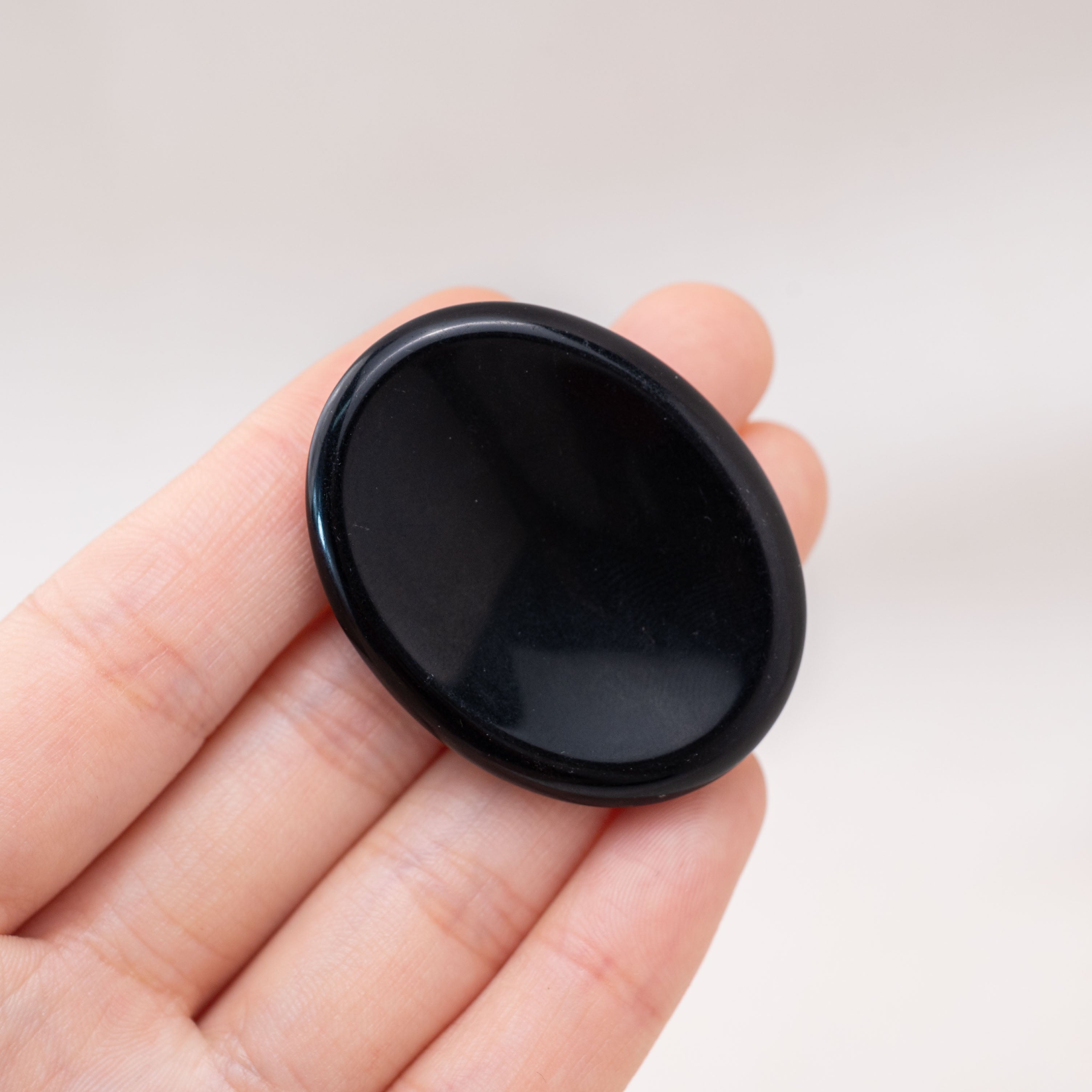 The Black Obsidian Worry Stone is a must-have for emotional balance and protection