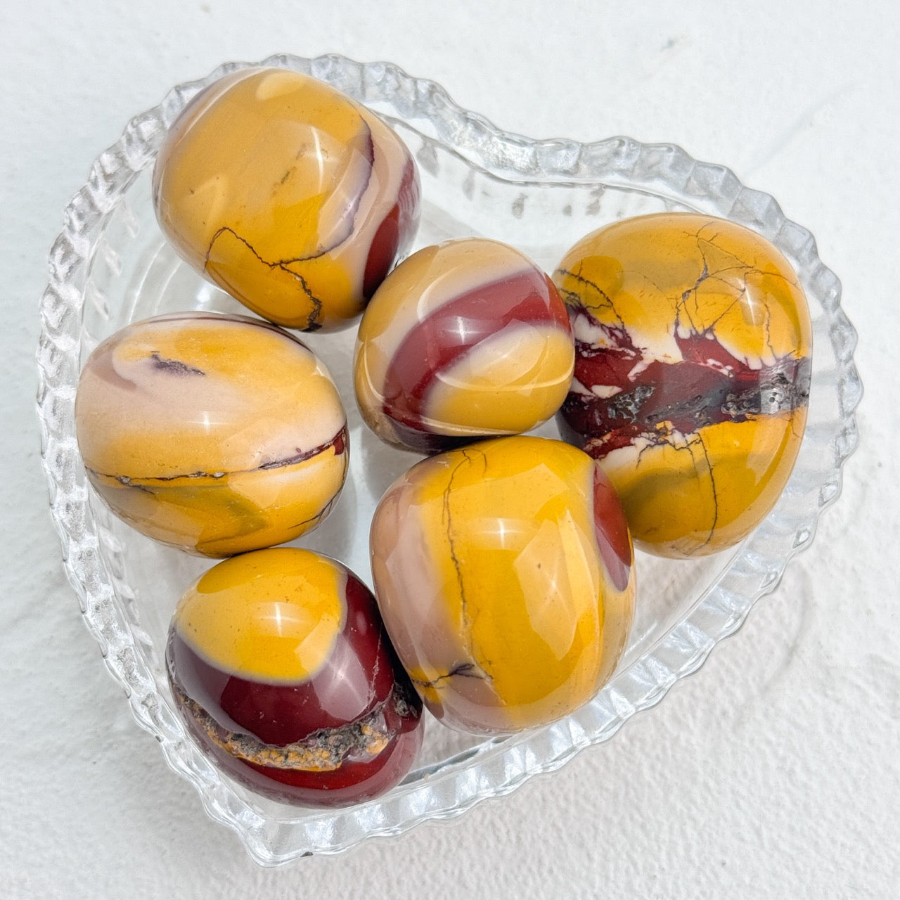 Mookaite Jasper Tumble with distinct red and yellow patterns