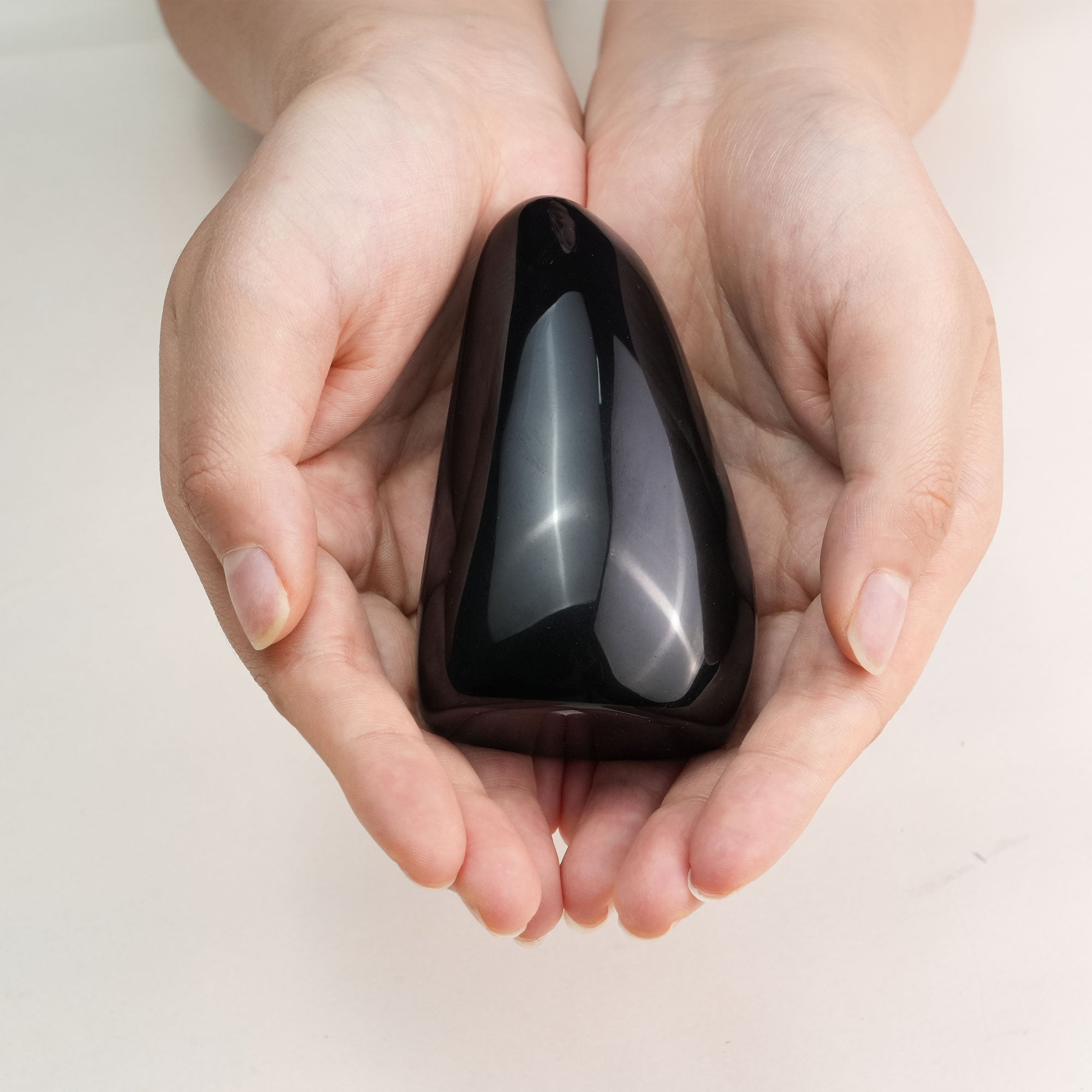 Gorgeous Rainbow Obsidian Crystal, revealing its captivating hues