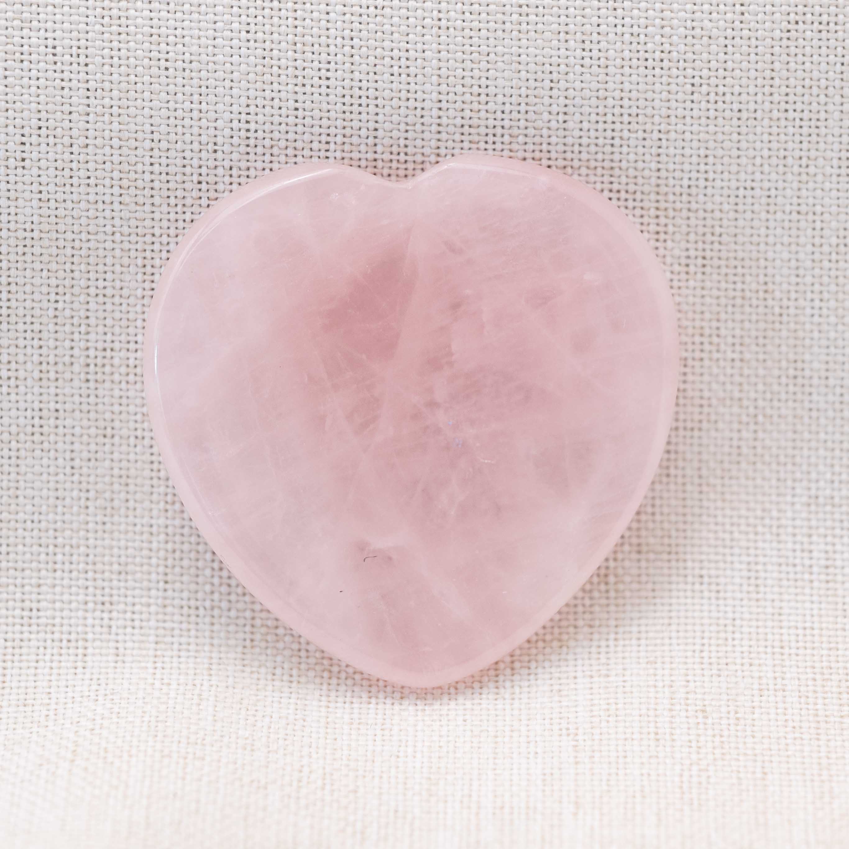 Carry the Rose Quartz Heart Worry Stone to foster empathy and emotional balance