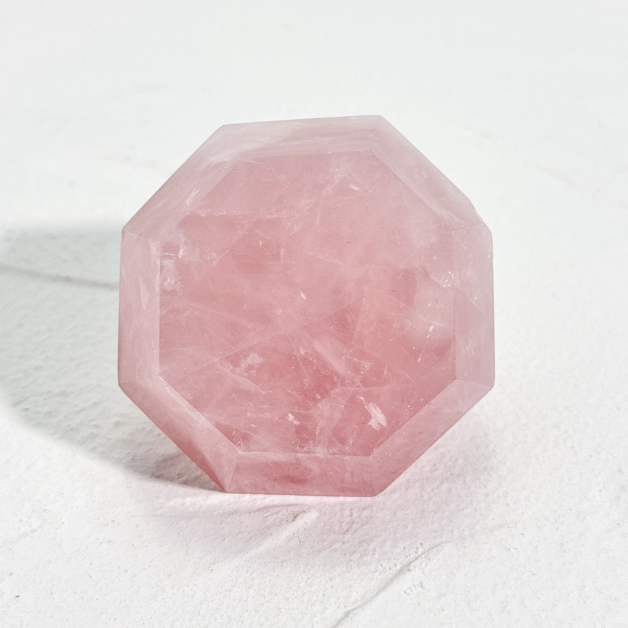 Rose quartz crystal with diamond point for heart chakra healing