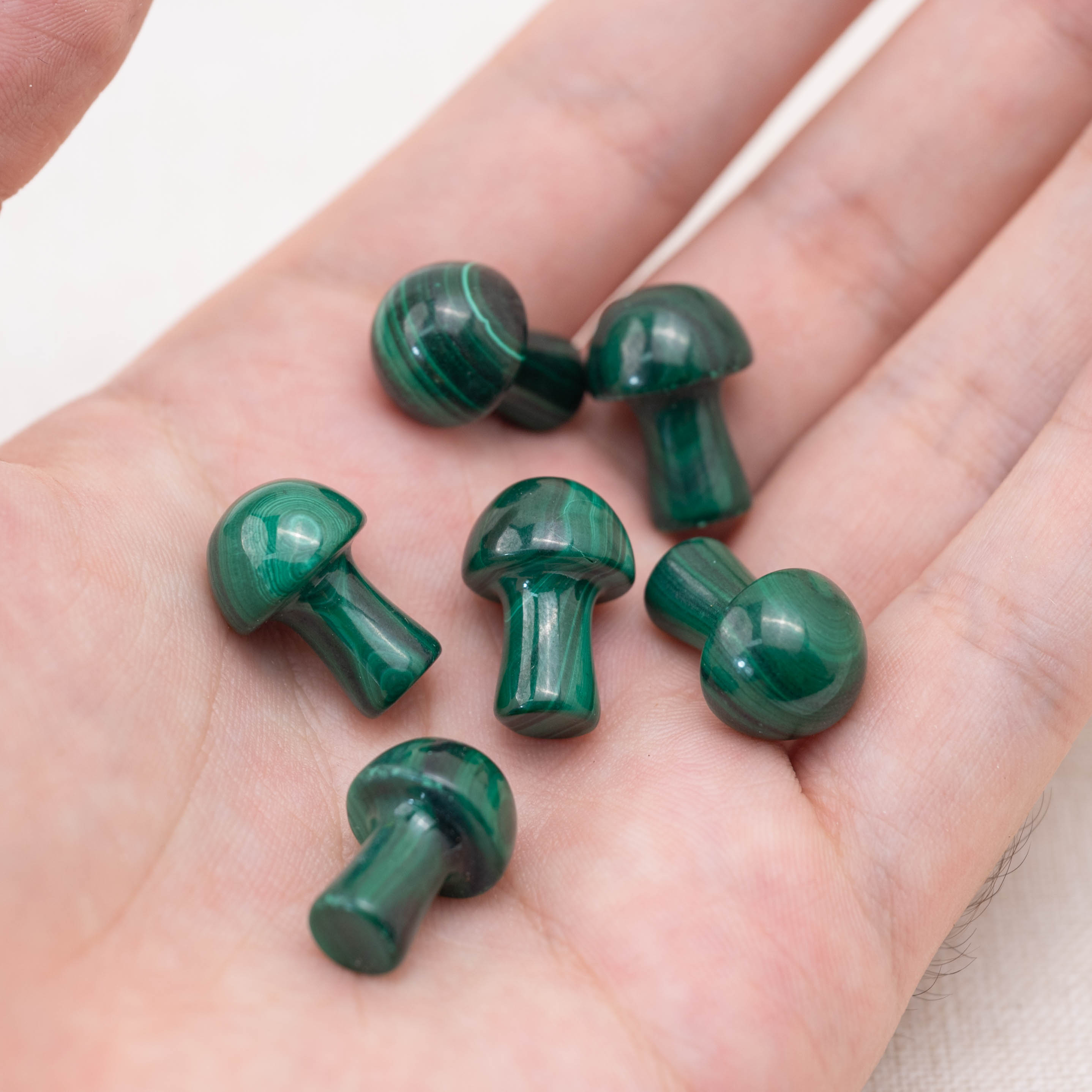 This intricately carved Malachite Mushroom is perfect for those seeking emotional healing and balance.