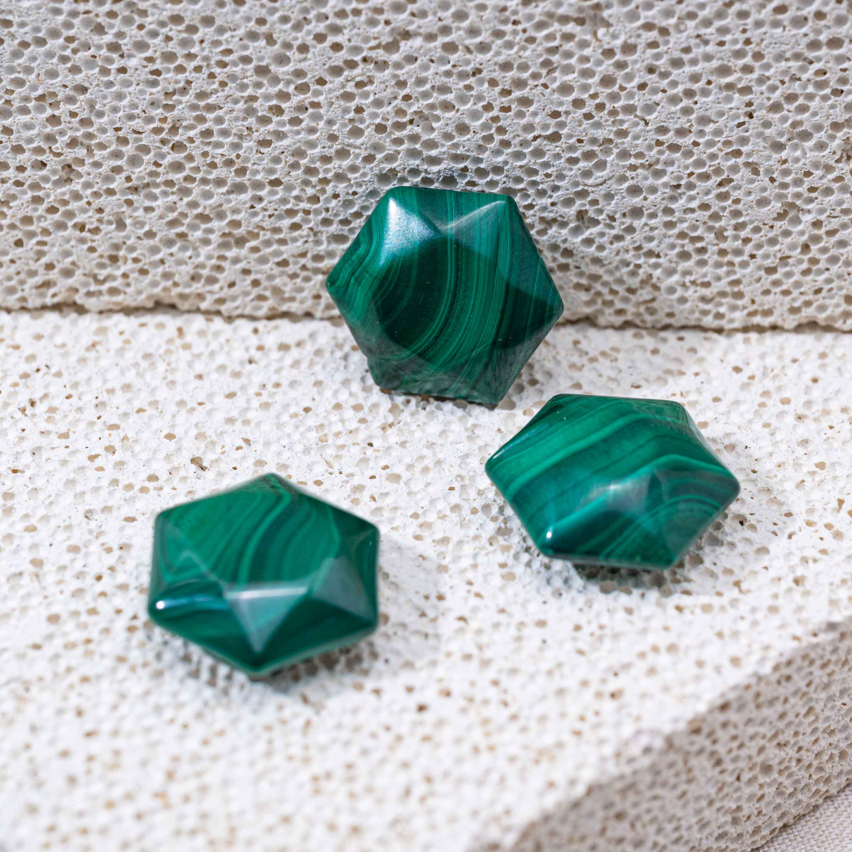 Enhance your home decor with this stunning Malachite Star of David, a symbol of balance and protection.