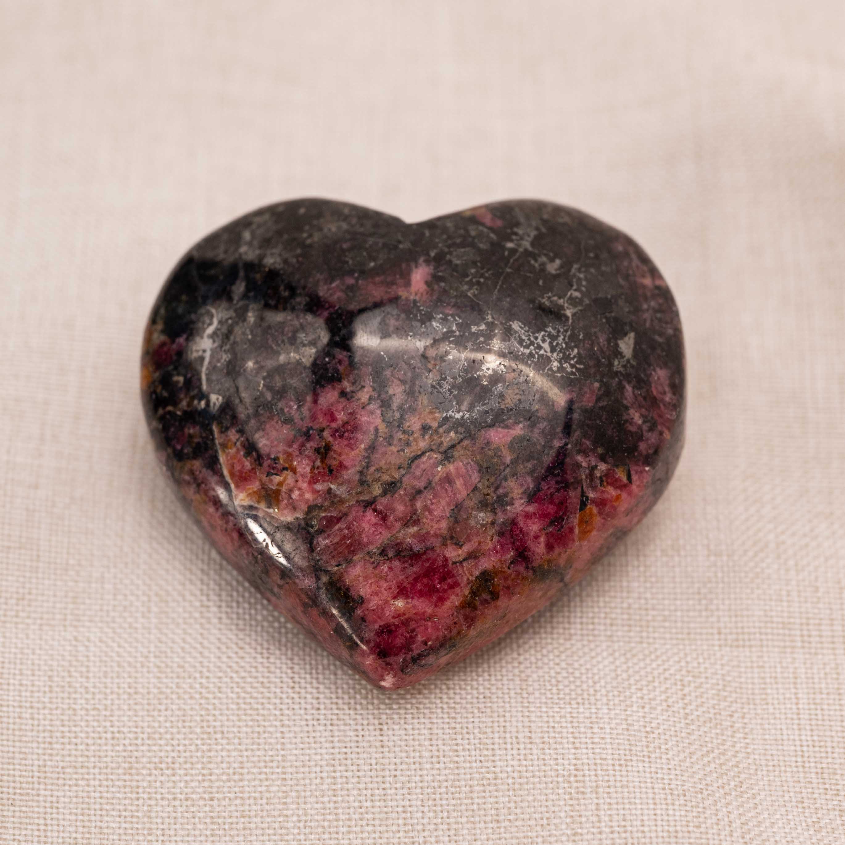The Pink Rhodonite Heart is known for its ability to boost self-confidence and promote personal growth