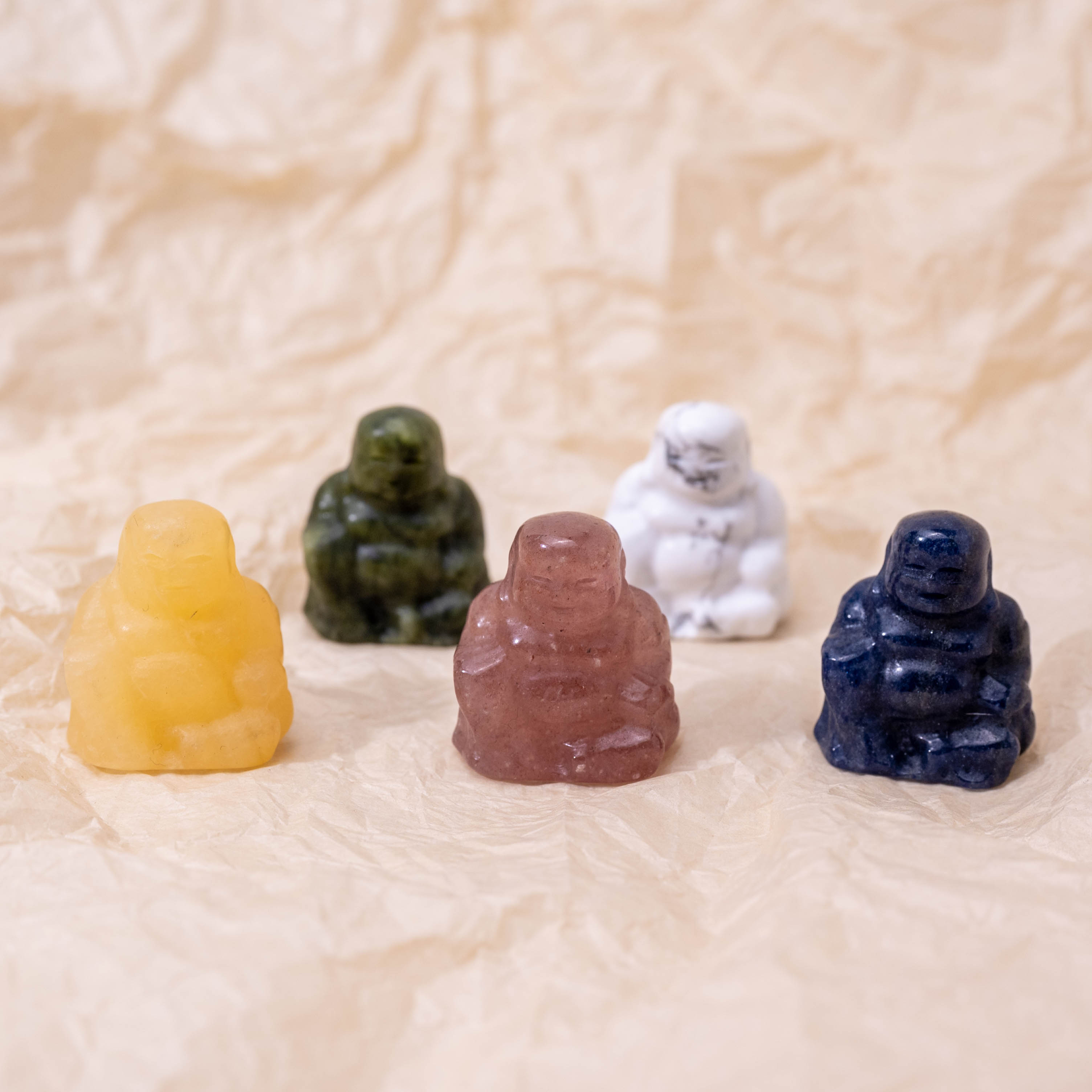 Mini Buddha statues artistically displayed, perfect for a zen-inspired space.