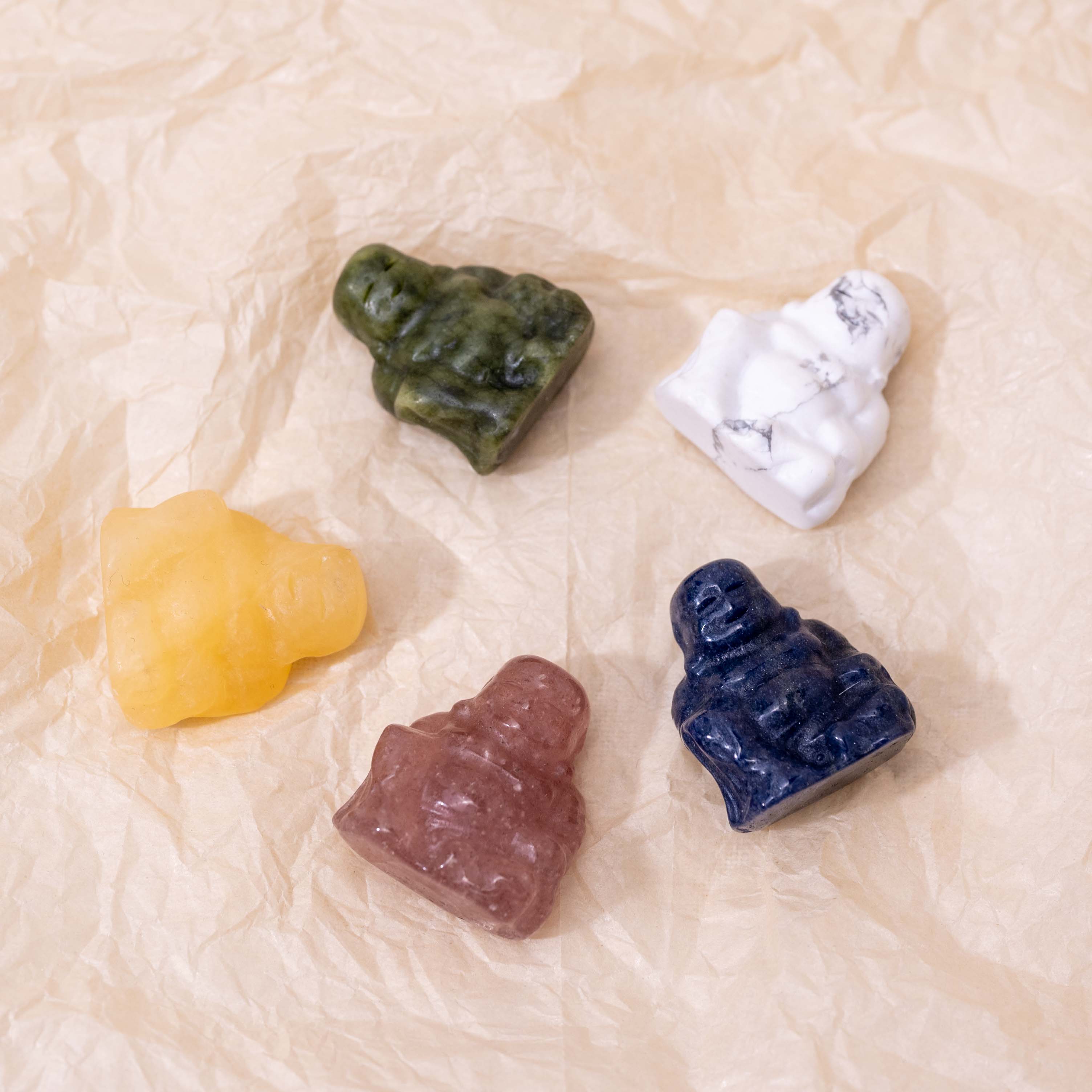 Flat lay of a Mini Buddha statue, ideal for meditation spaces.