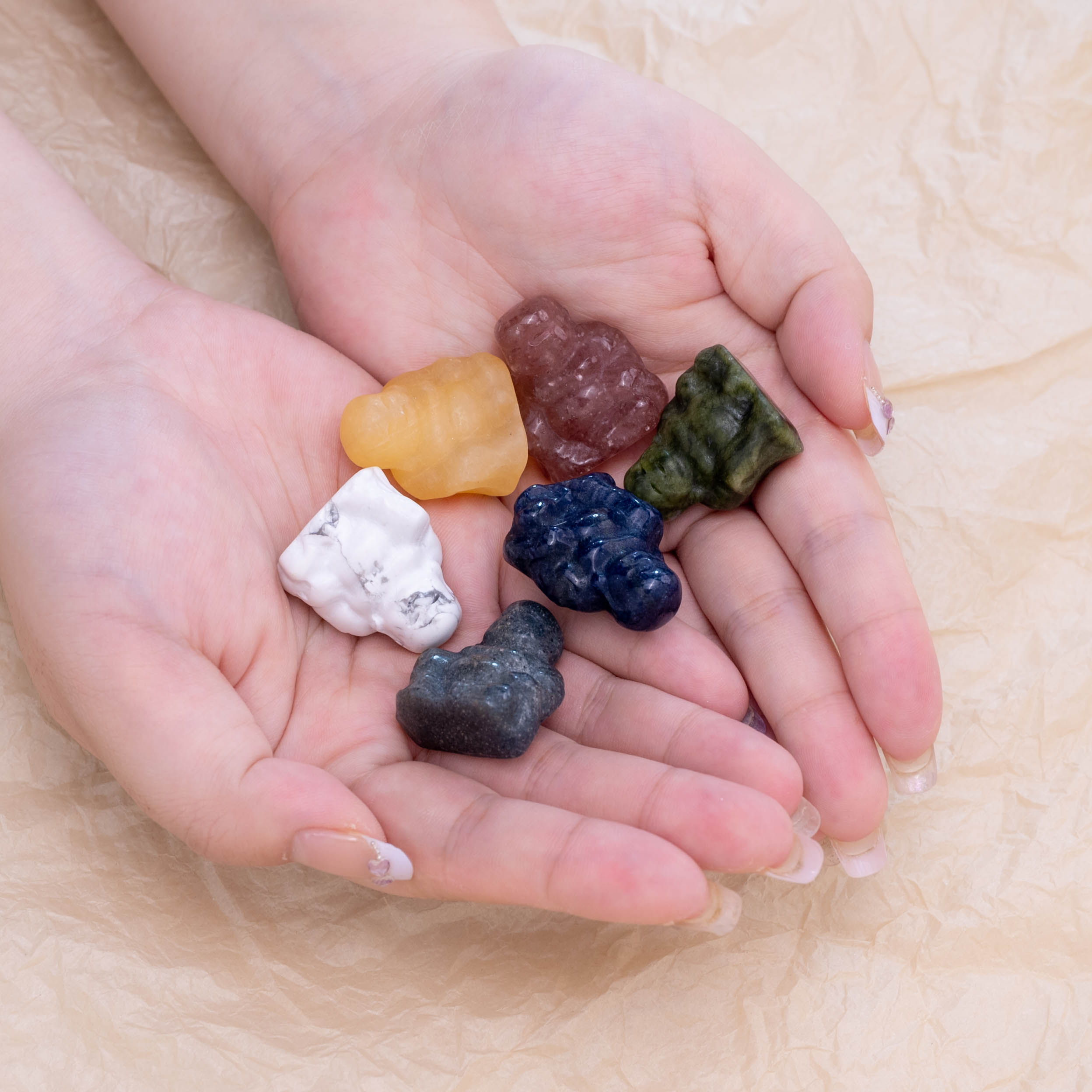 Handheld view of a Mini Buddha, perfect for meditation and decoration.
