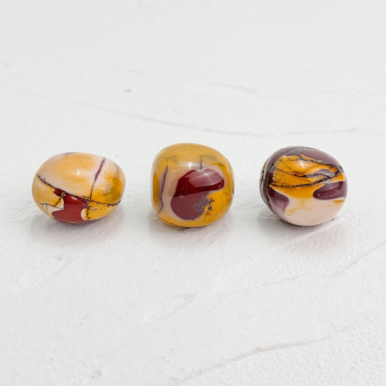 Assorted collection of Mookaite Jasper Tumble stones