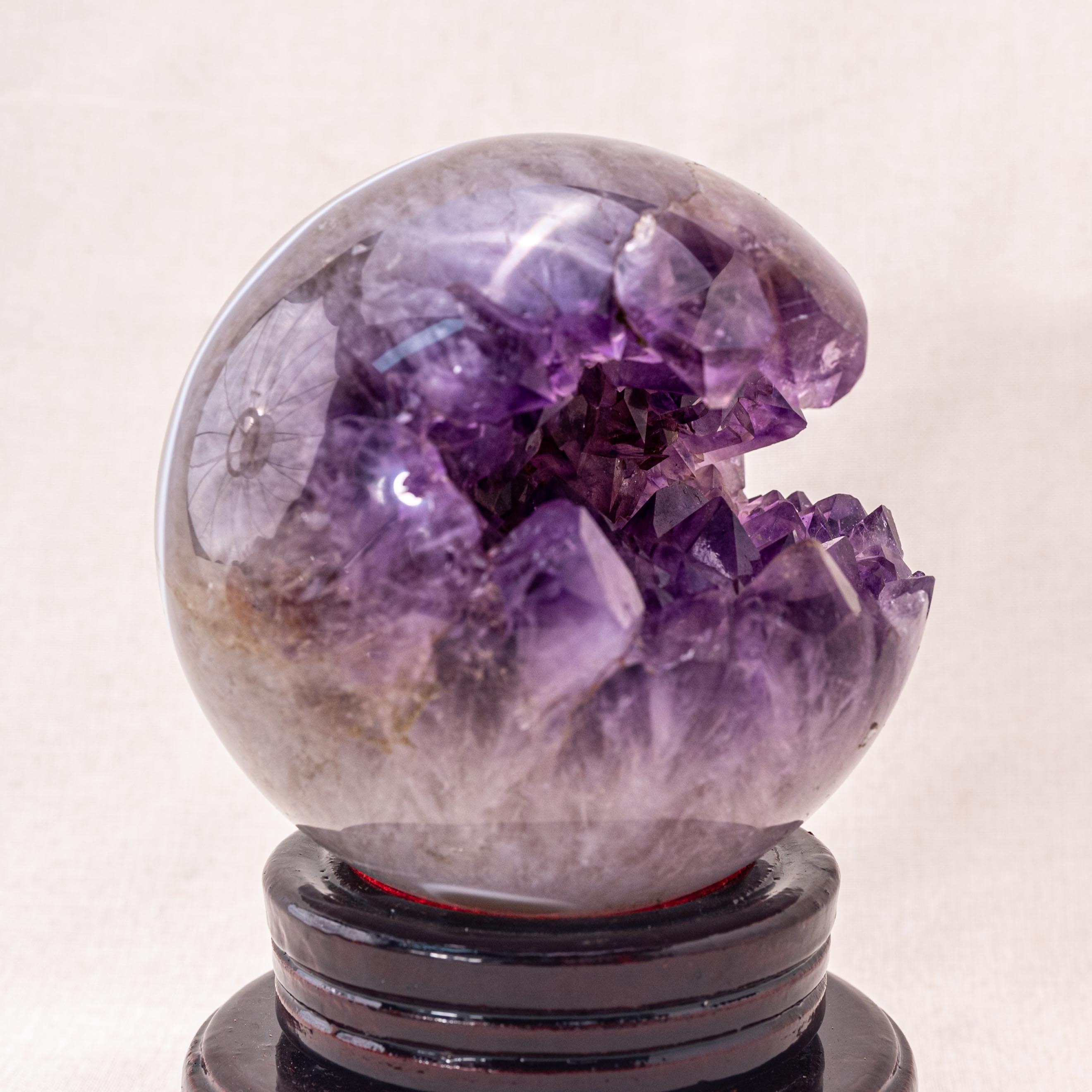 Handcrafted amethyst sphere, perfect for enhancing meditation and relaxation