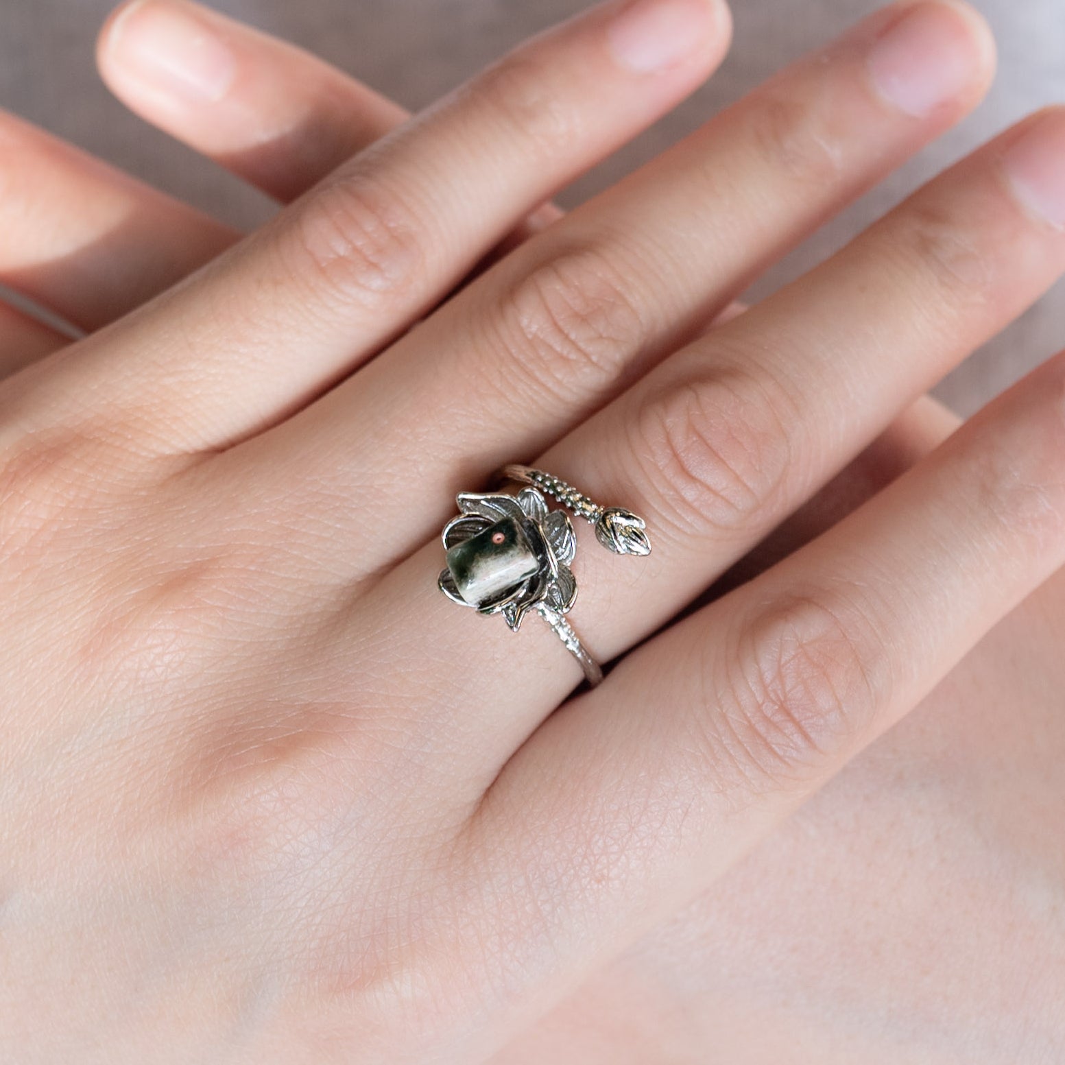 Beautiful Ocean Jasper Lotus Ring, symbolizing purity.