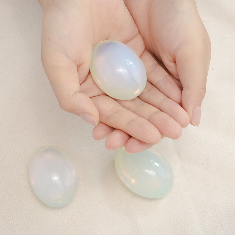 Hand-polished Opalite Palm Stone promoting relaxation and inner peace