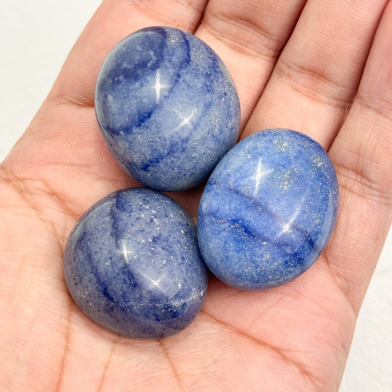 Close-up of blue aventurine bracelet showcasing its unique iridescence
