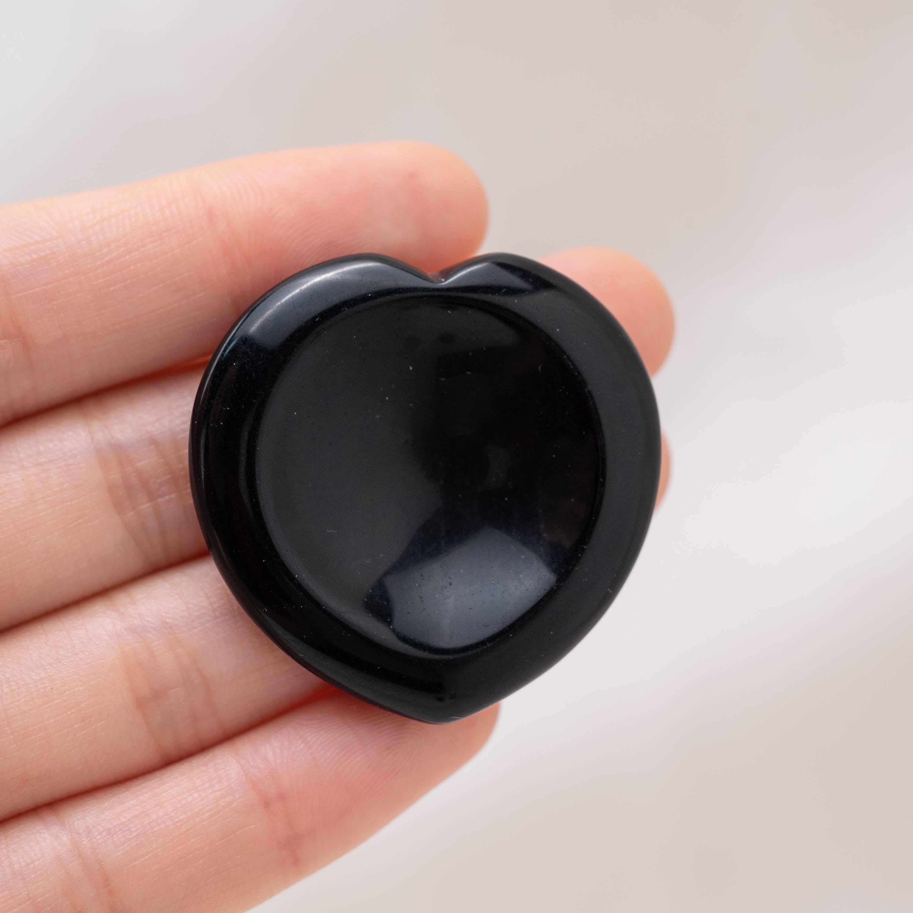 The Black Obsidian Heart Worry Stone provides powerful grounding and protection