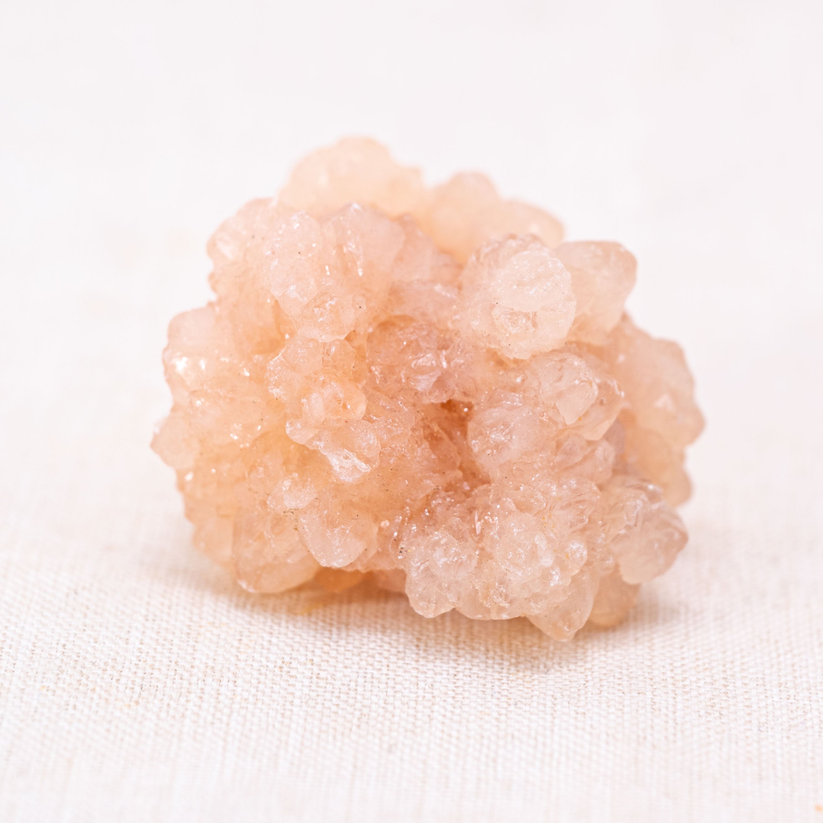 This natural red calcite crystal enhances vitality and physical energy.