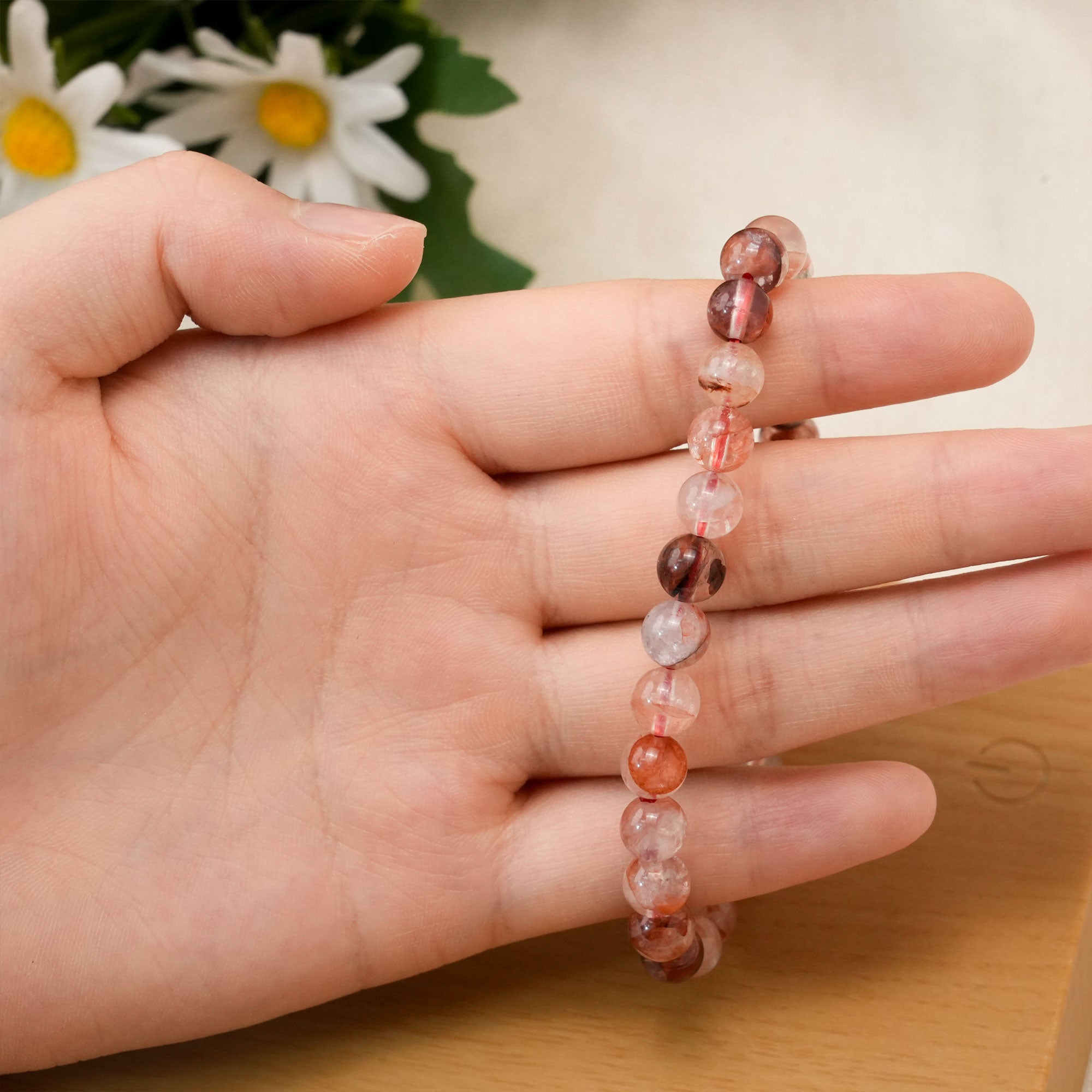 Vibrant Red Fire Quartz crystal bracelet enhancing courage, perfect for overcoming challenges