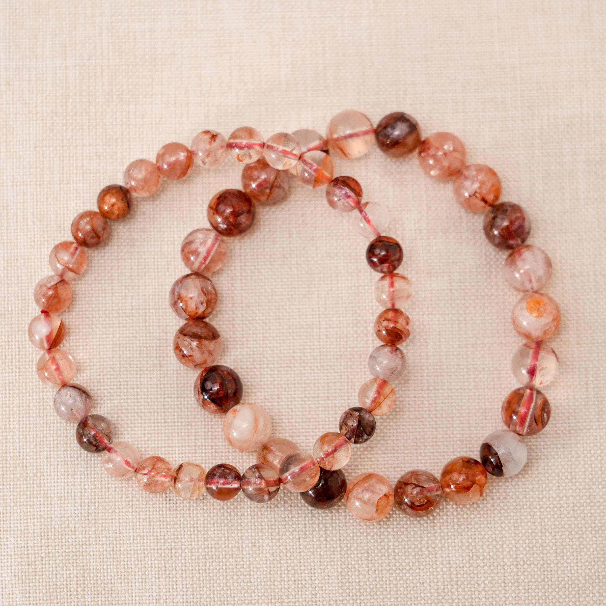 The Red Fire Quartz Bracelet works to open and balance the heart chakra