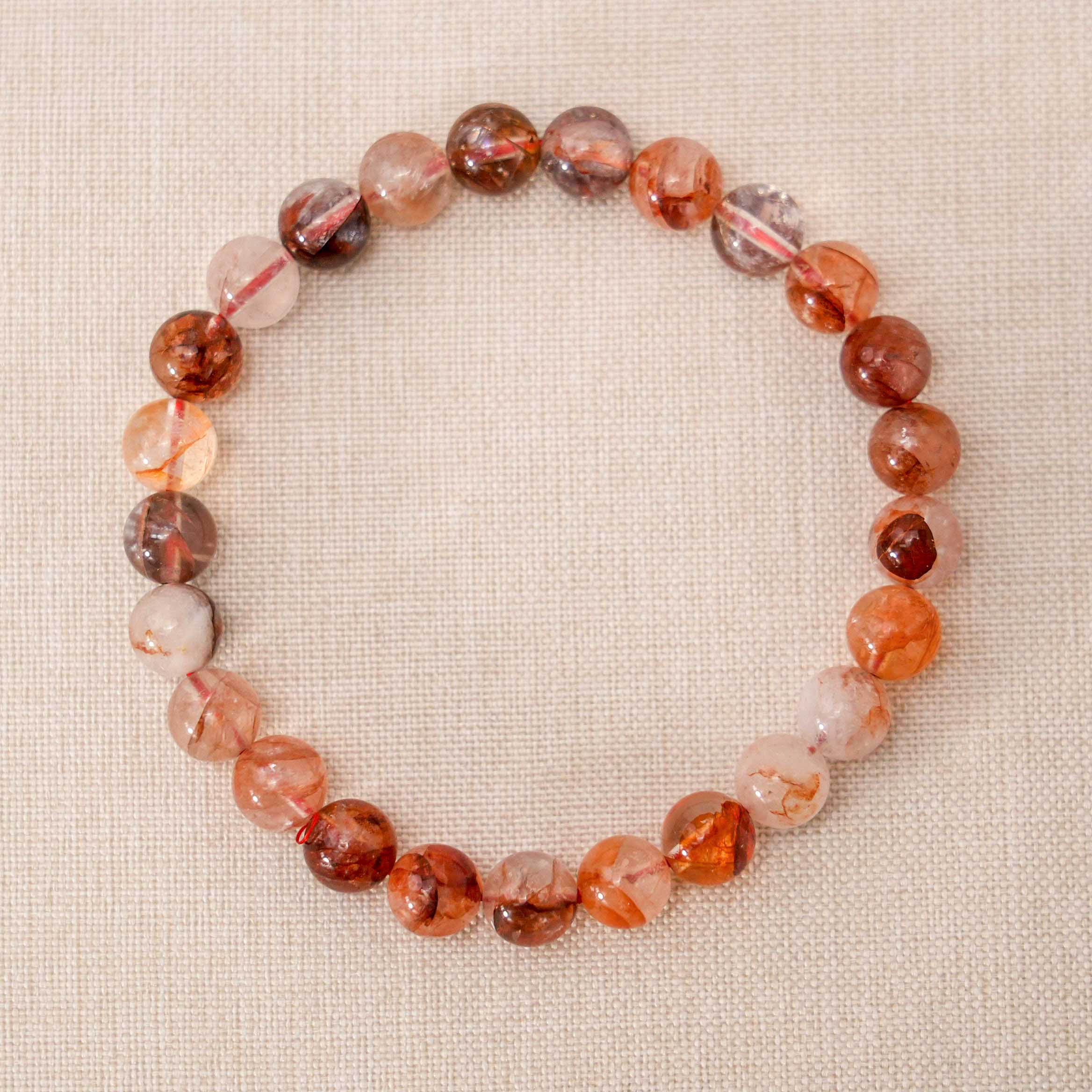 This Red Fire Quartz Prosperity Bracelet is imbued with the energy of abundance