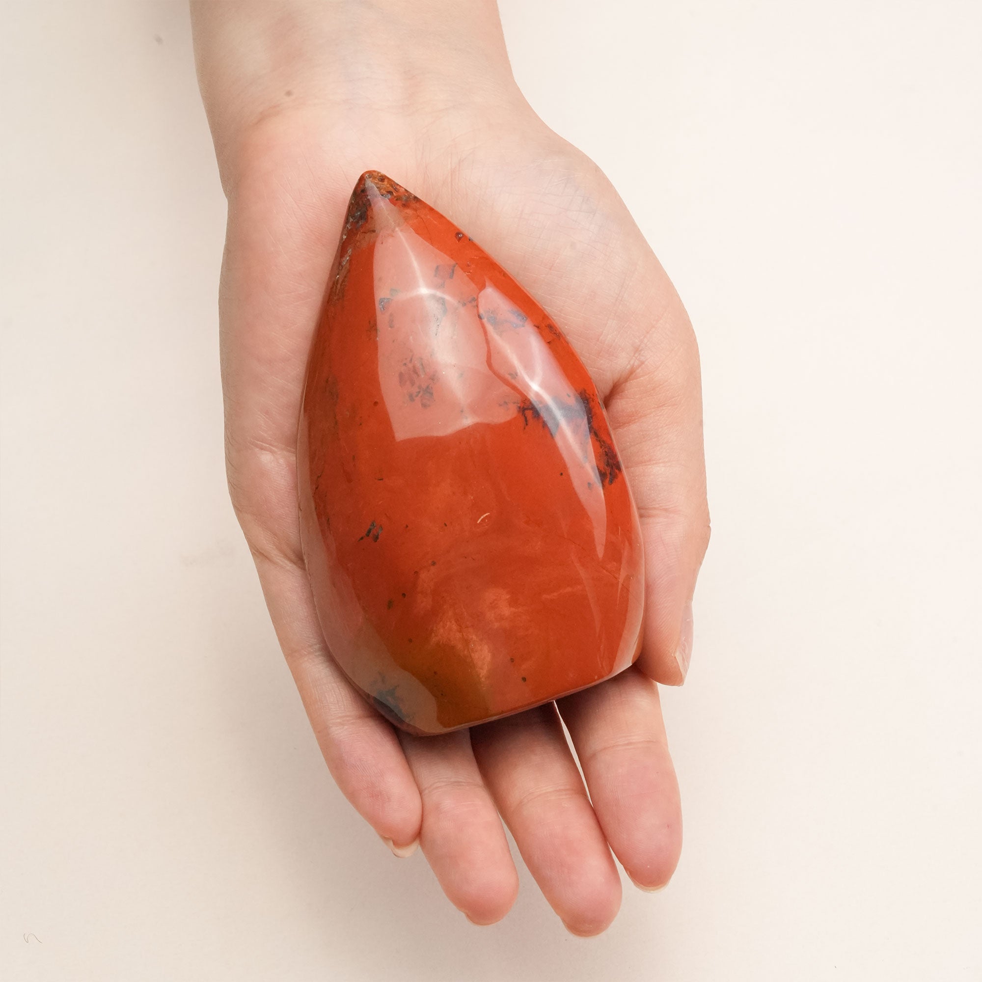 Close-up of Red Jasper Freeform Crystal showing intricate details and rich hues