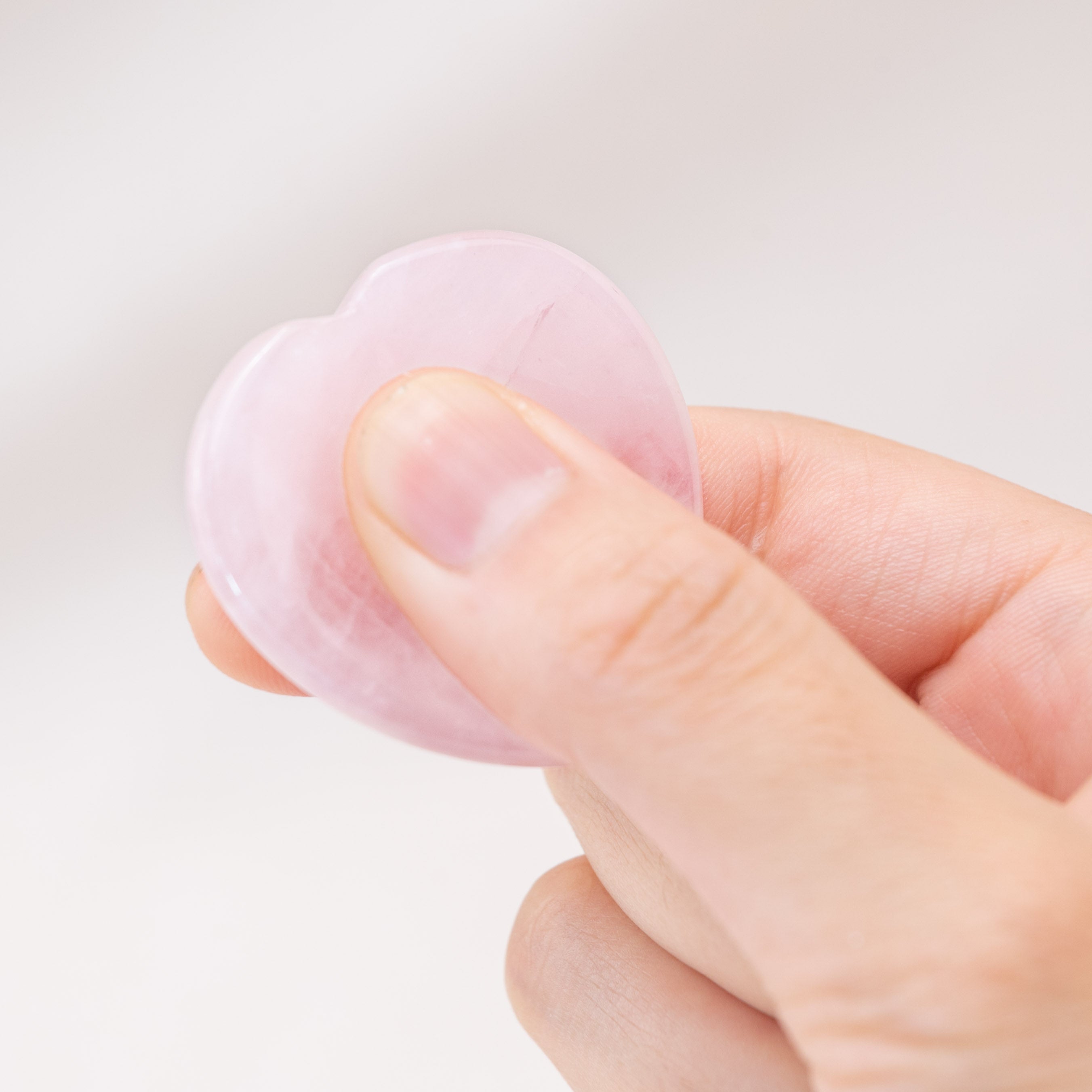 Incorporate the Rose Quartz Heart Worry Stone into your meditation practice