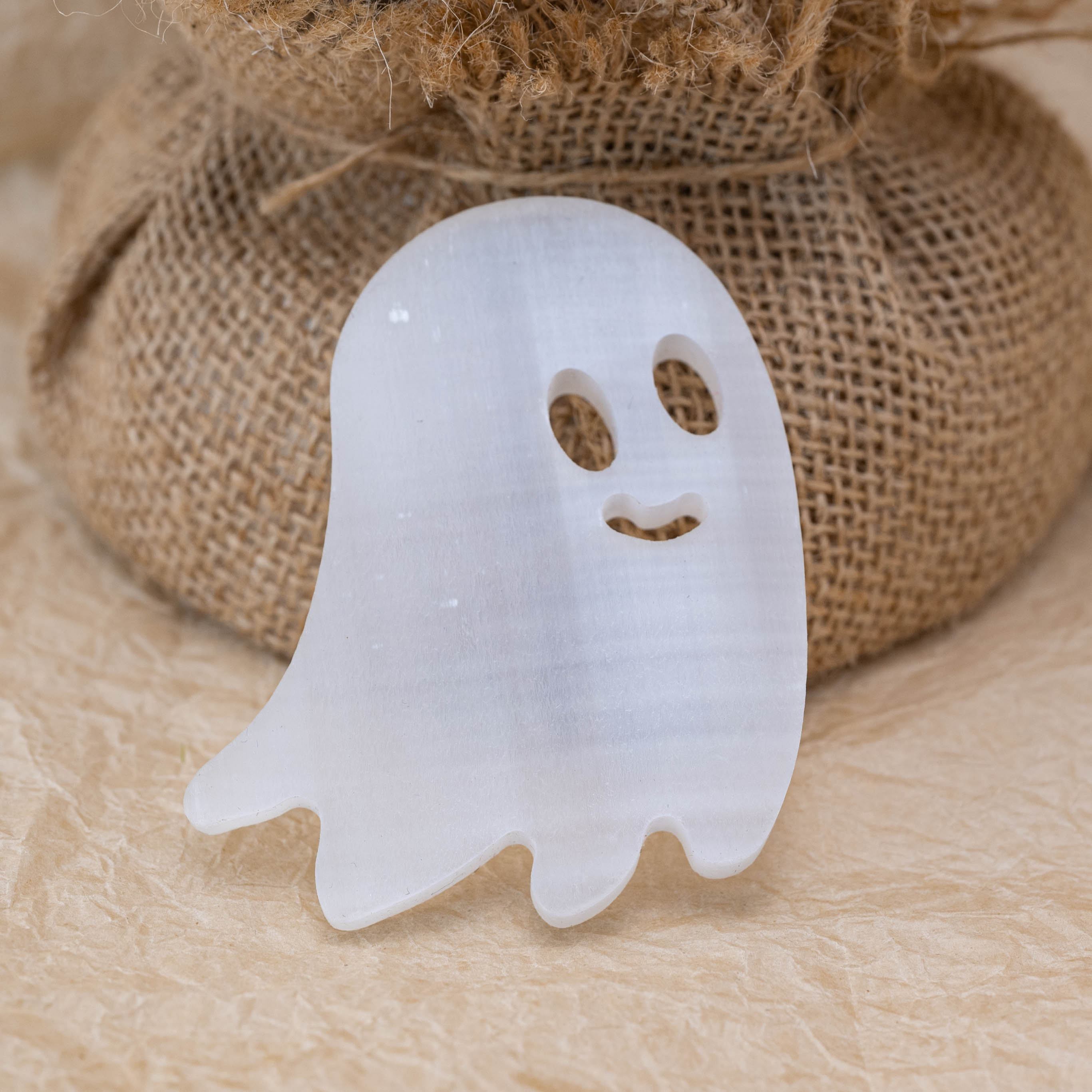 The Selenite Ghost carving cleanses negative energy.