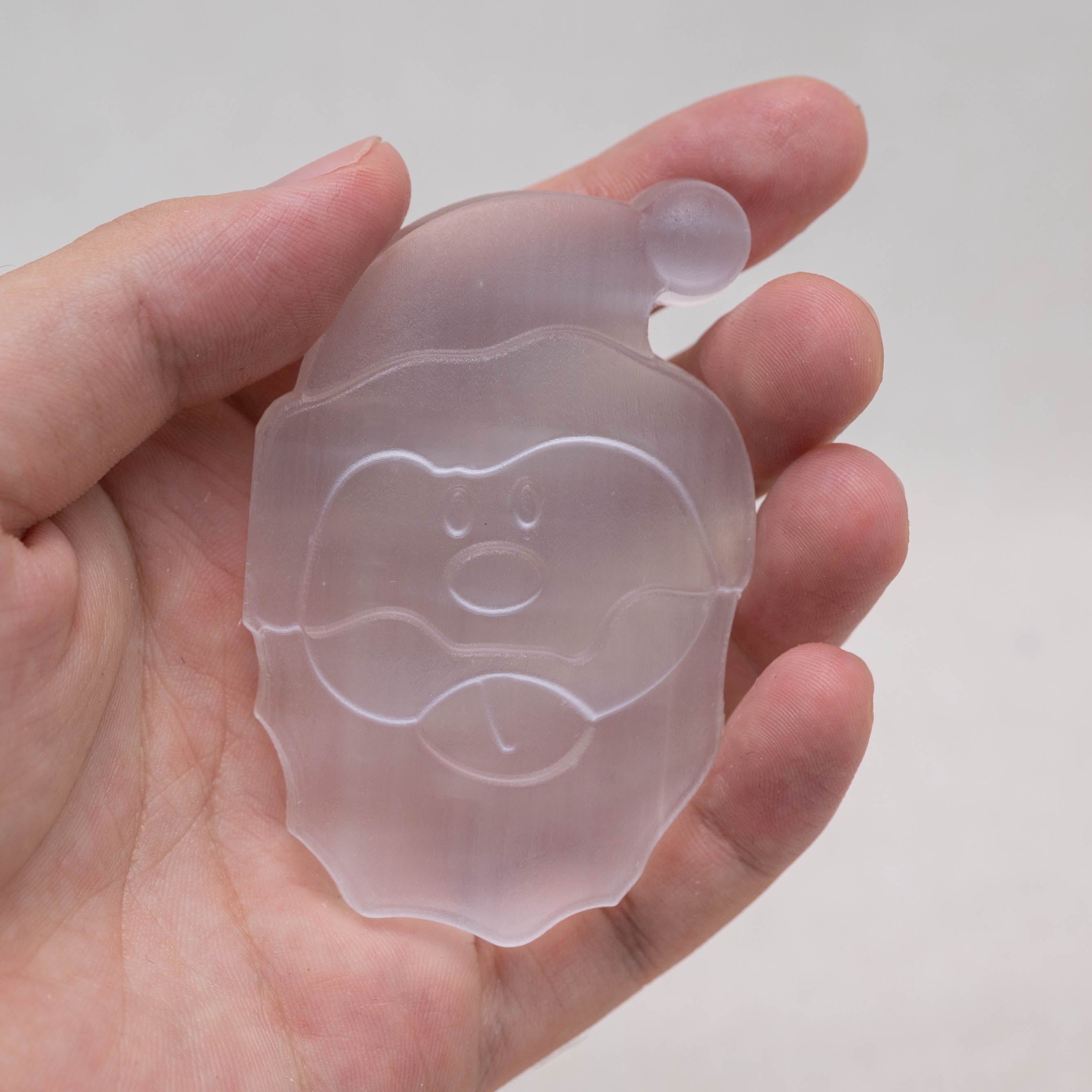 This Selenite Santa Claus carving fosters a peaceful environment.