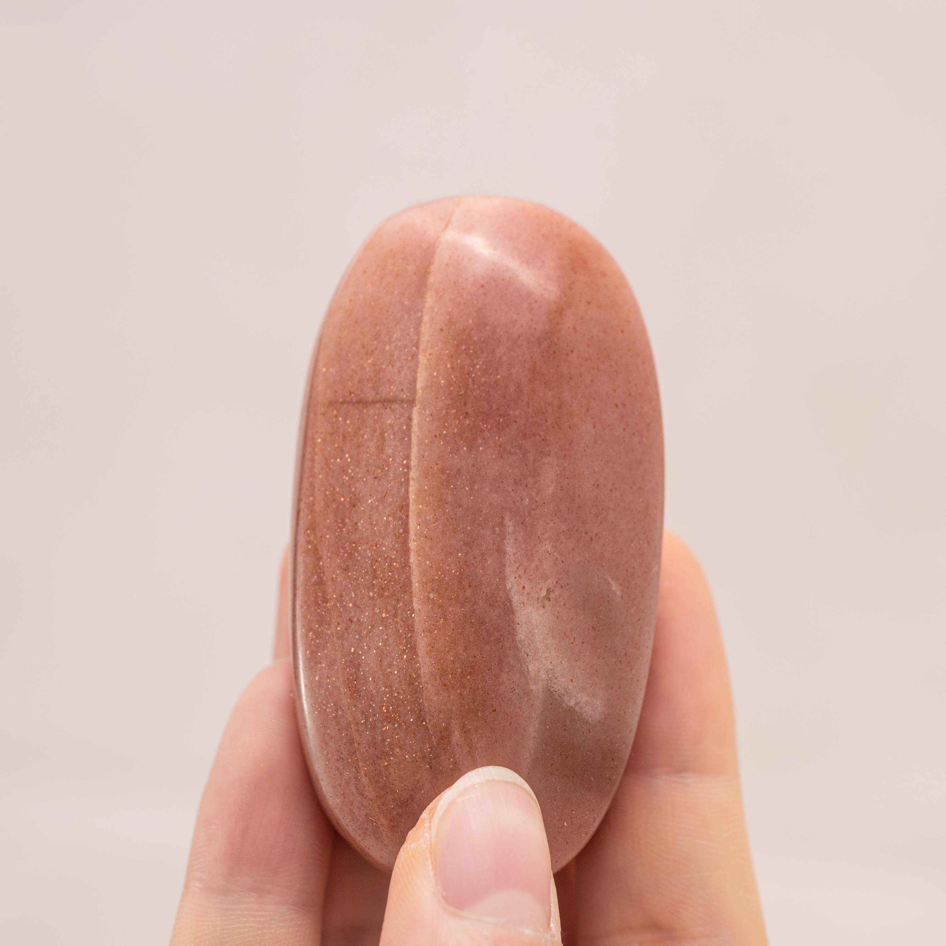 Hand-polished Golden Sun Stone Palm Stone, perfect for enhancing vitality