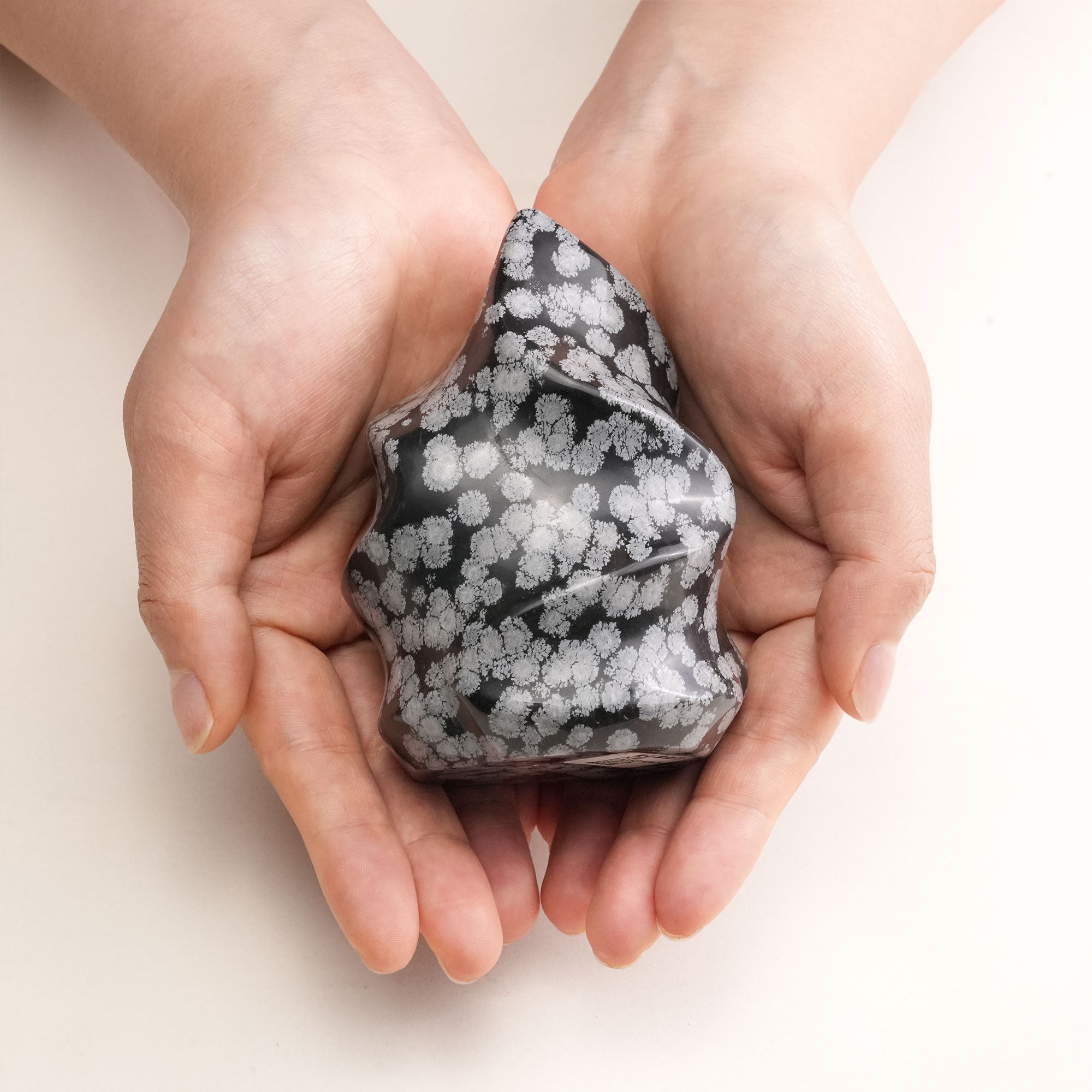 Polished Snowflake Obsidian Flame with intricate snowflake-like inclusions