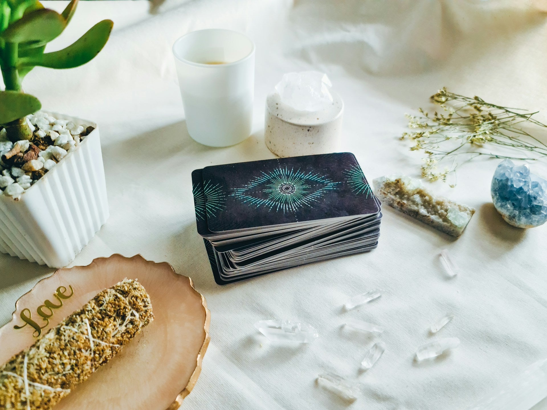 Spiritual healing setup featuring tarot cards and crystals for enhanced energy and insight