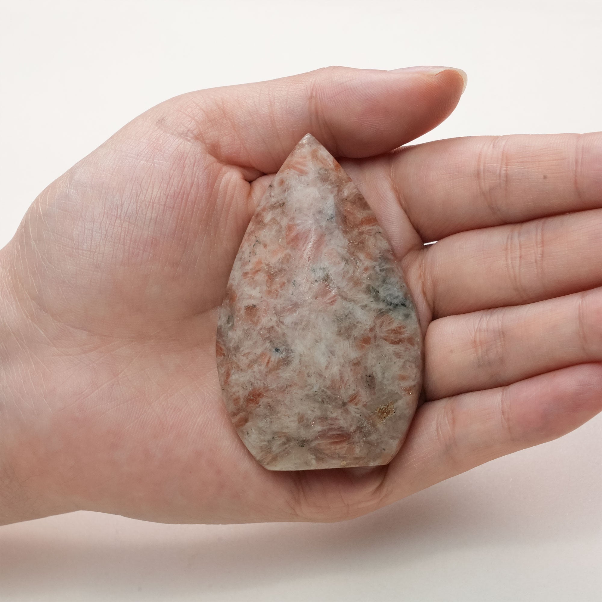 Polished Sun Stone crystal, radiating natural beauty