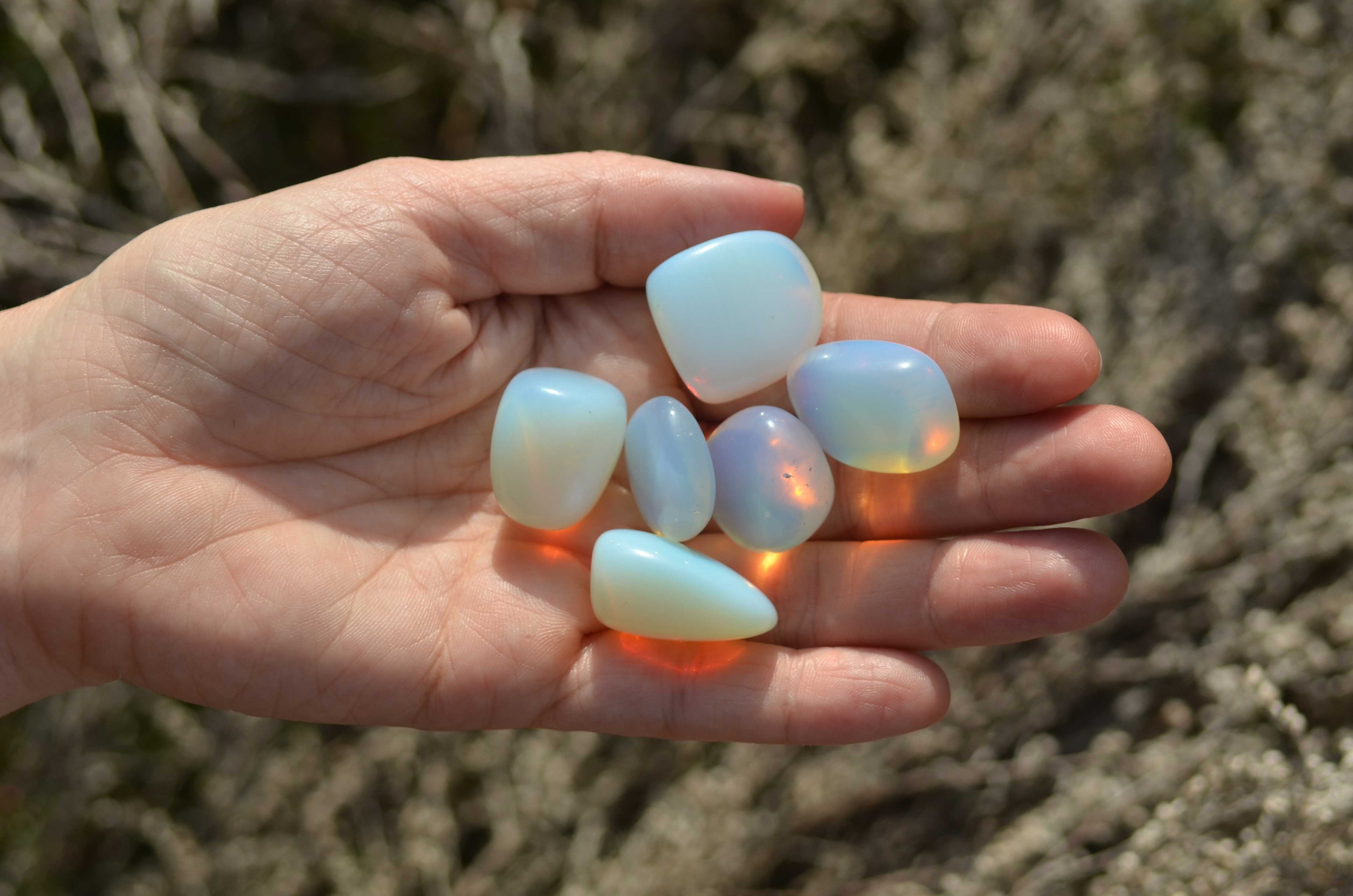 Close-up of a vibrant Opal gemstone showcasing its dazzling play of color