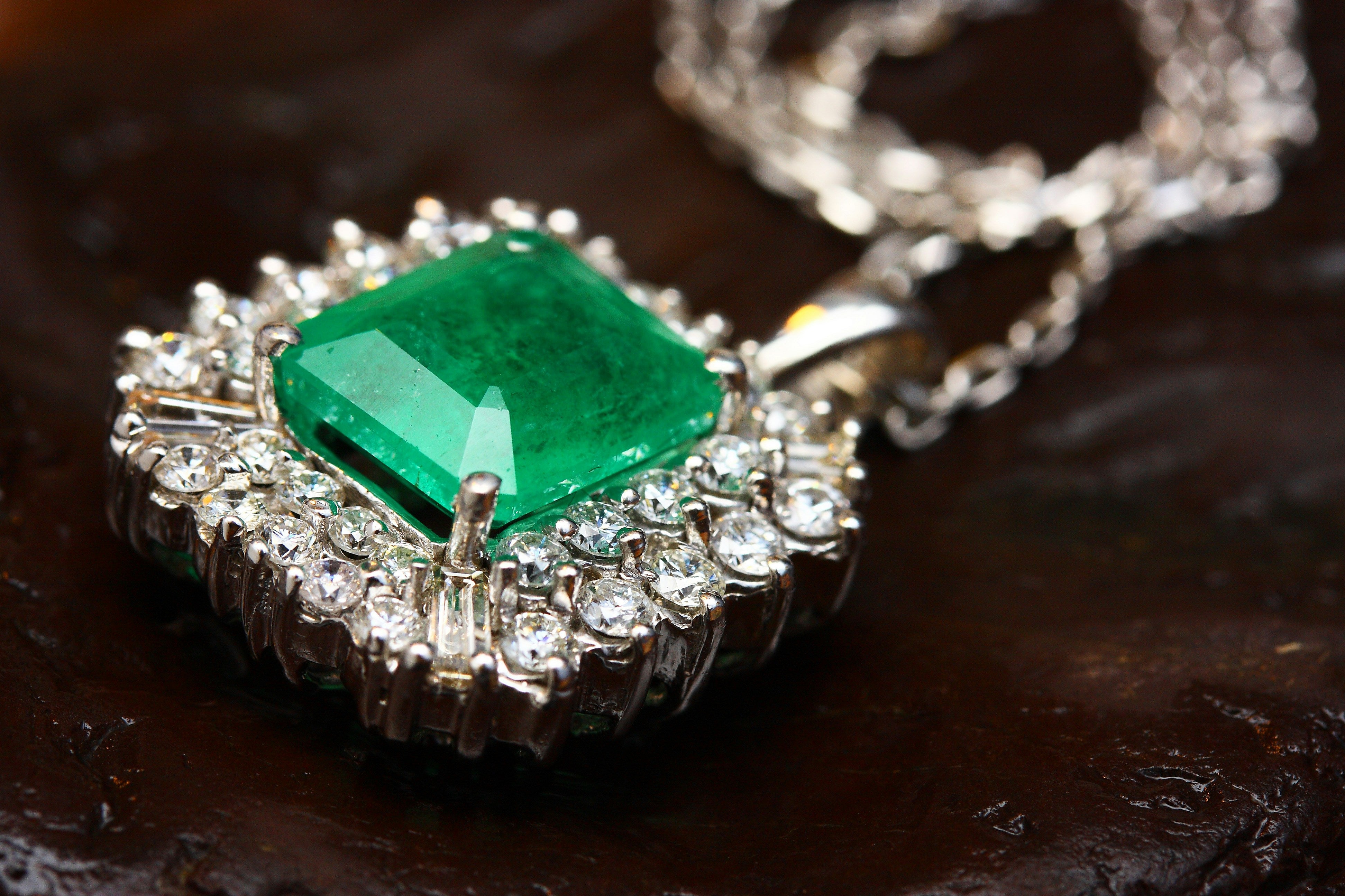 Genuine emerald stone with natural inclusions