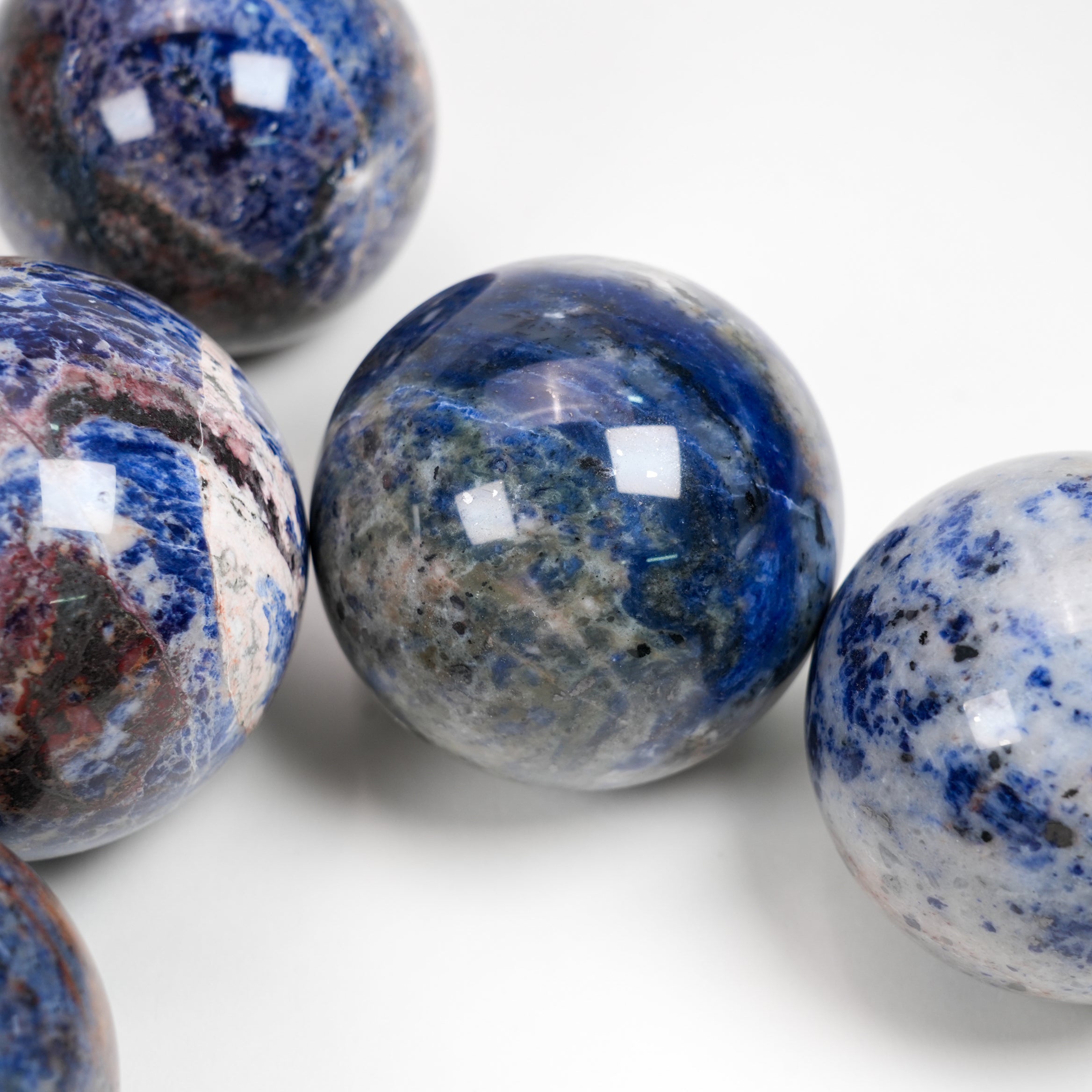 Natural Sodalite Sphere 6.6cm (2.6in) | Hand‑Polished Blue White Veined Mineral Orb