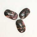 Black Rhodonite Palm Stone for Chakra Balancing and Alignment