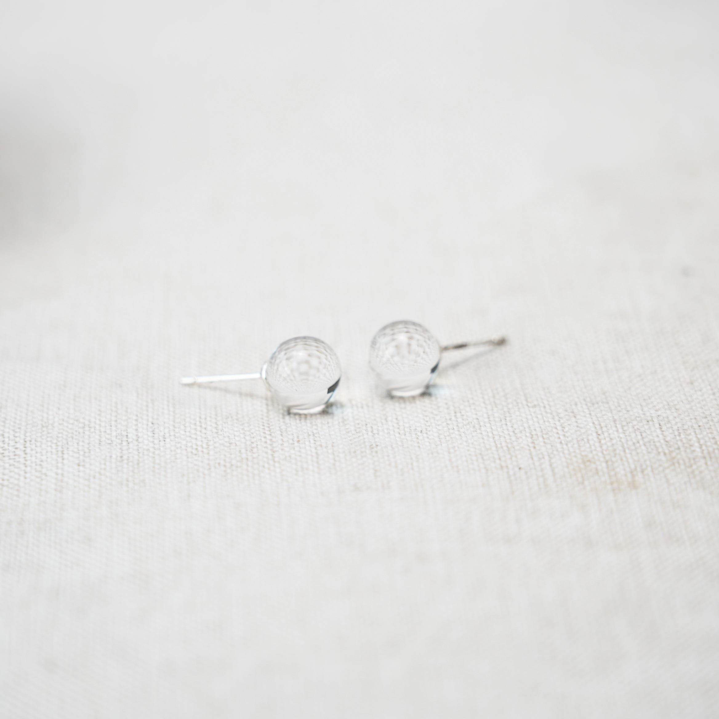 Exquisite clear quartz earrings set in sterling silver, perfect for gifting or personal use.