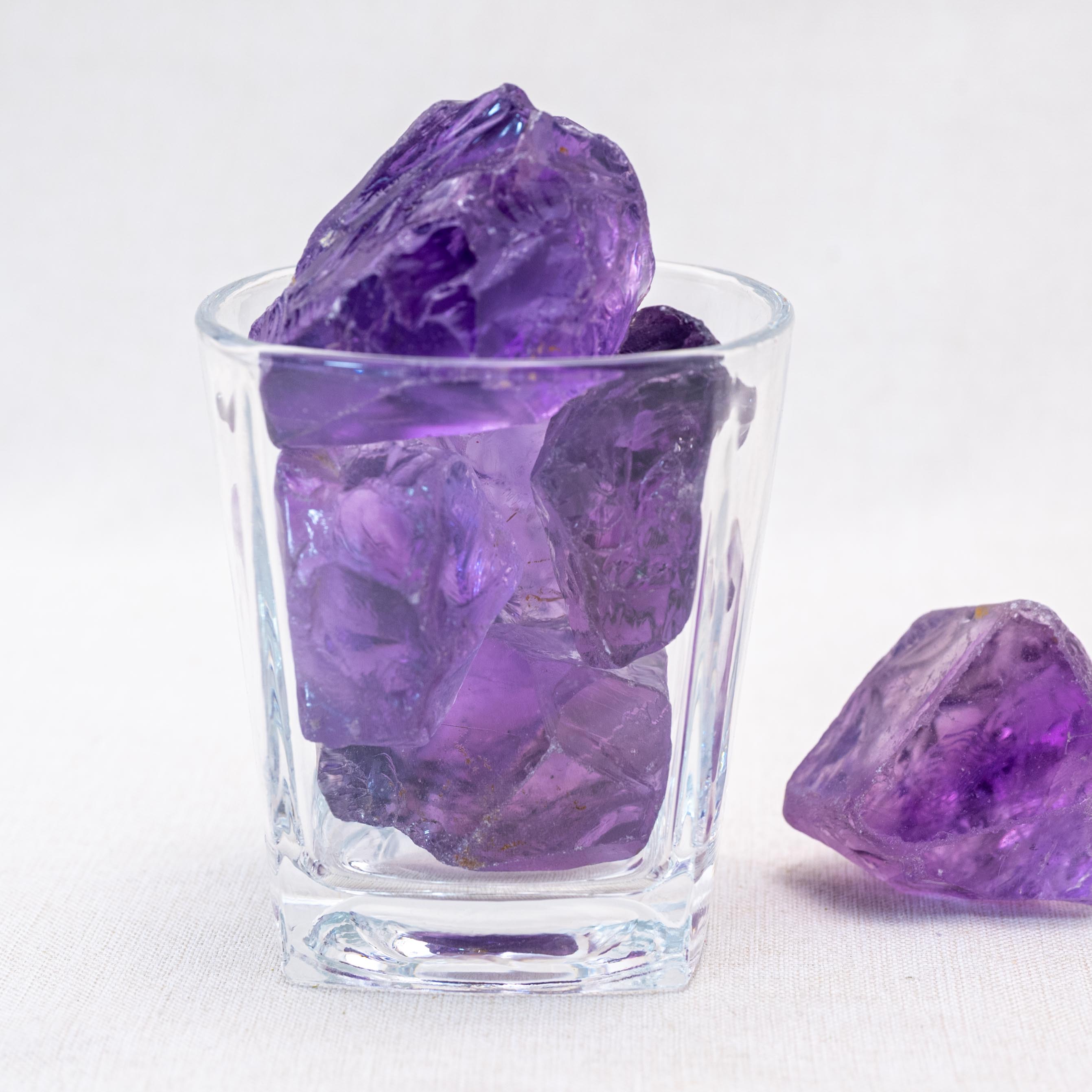 Unpolished amethyst stones enhance intuition