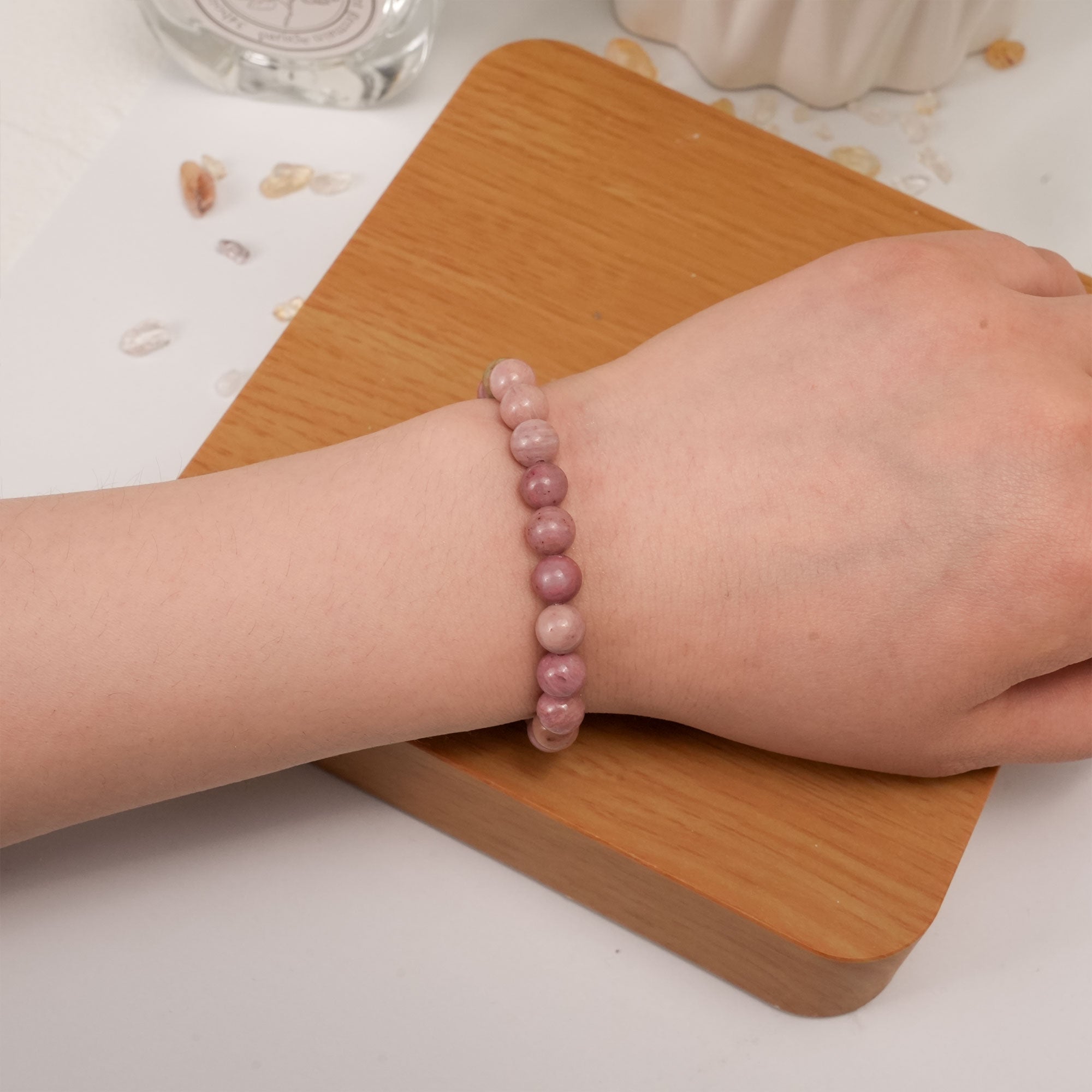 Stylish Rhodonite Bracelet showcasing unique marbled patterns, perfect for nurturing love and forgiveness